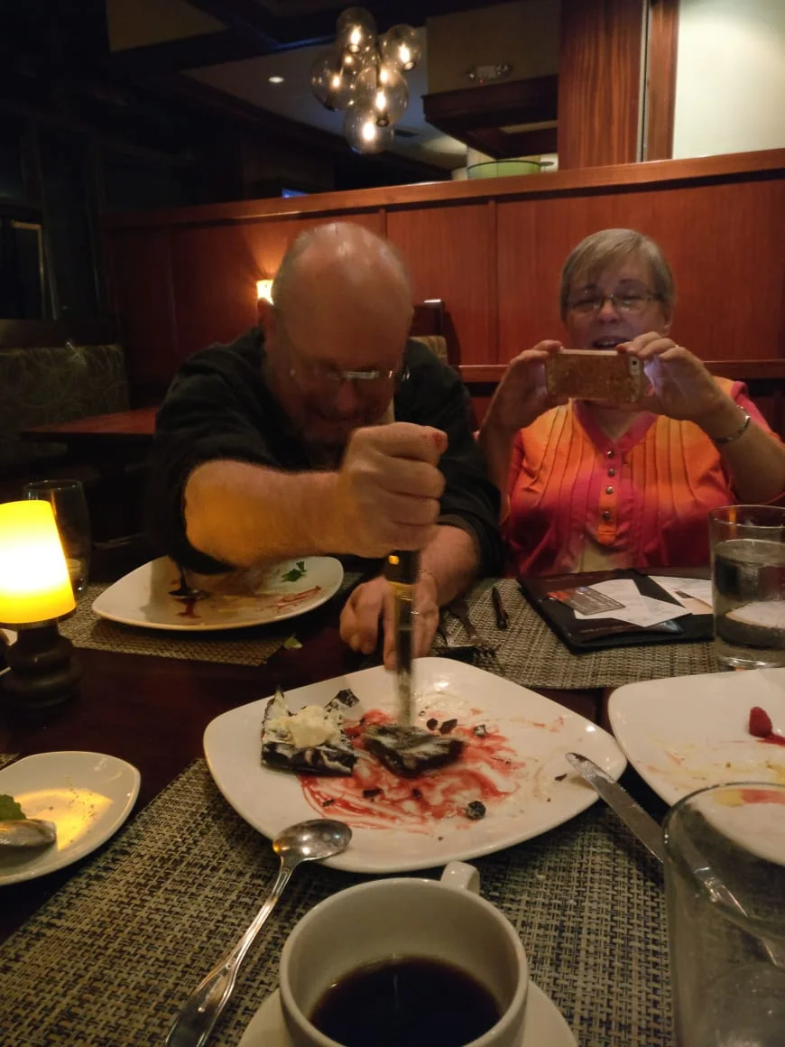 Joe Haldeman stabs a dessert