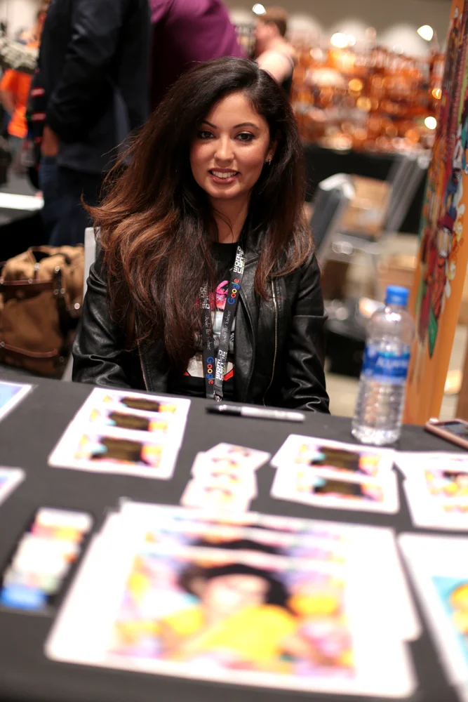 Vania Soto with her artwork (Photo by Dianita Cerón)