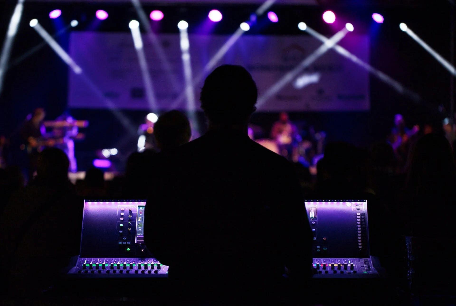silhouette-photo-of-people-beside-monitor-2952834.jpg