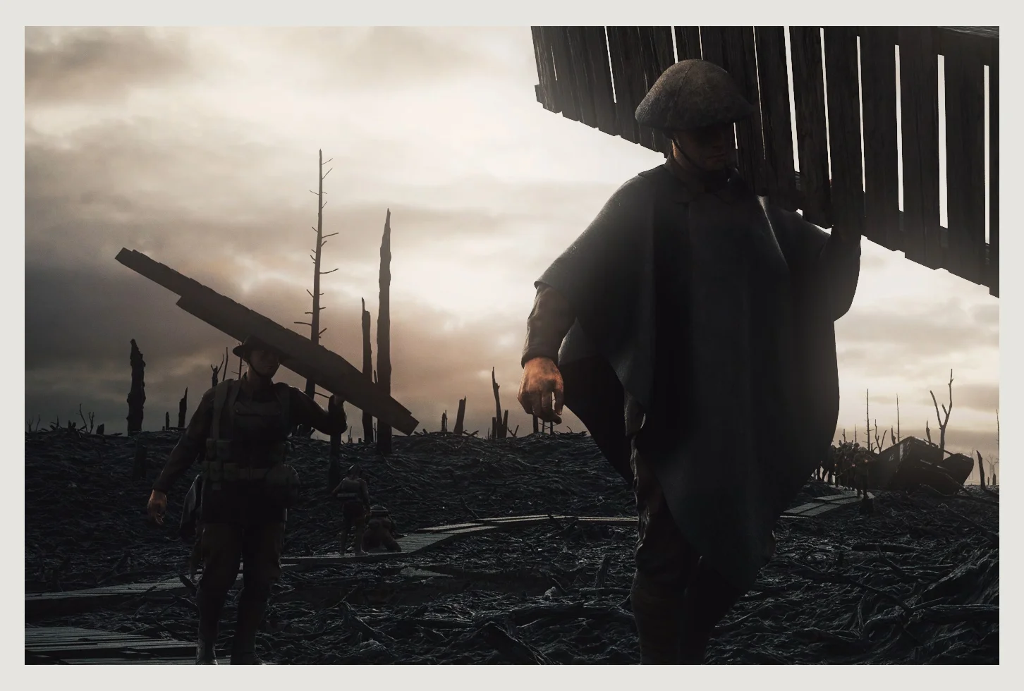 Anzac engineers carry duckboards to the front of the tracks they’re laying for the infantry’s single column advance to the front lines of battle in the Ypres Salient.