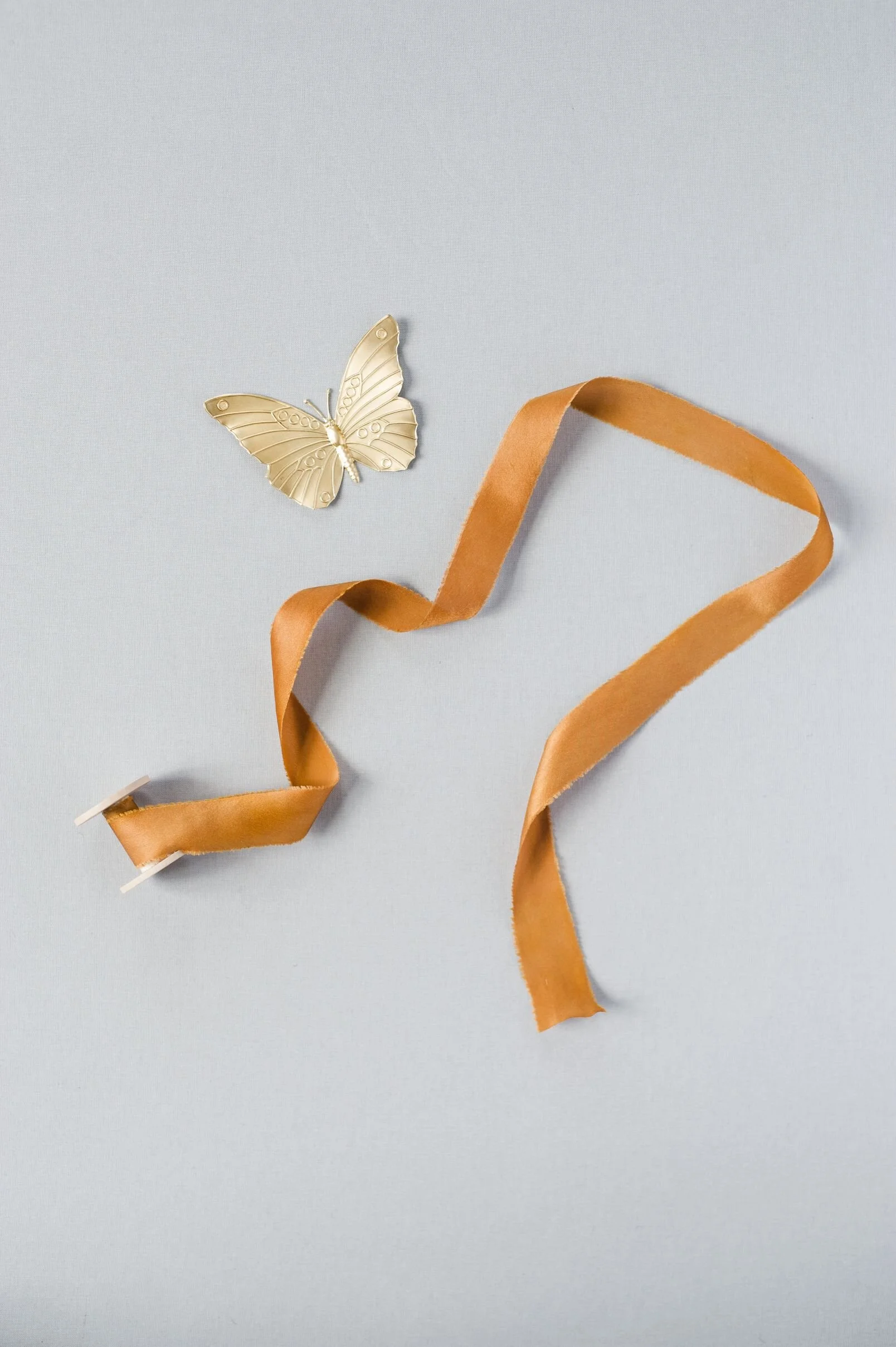 one yard of 1.2 inch silk ribbon, color rust + gold butterfly 