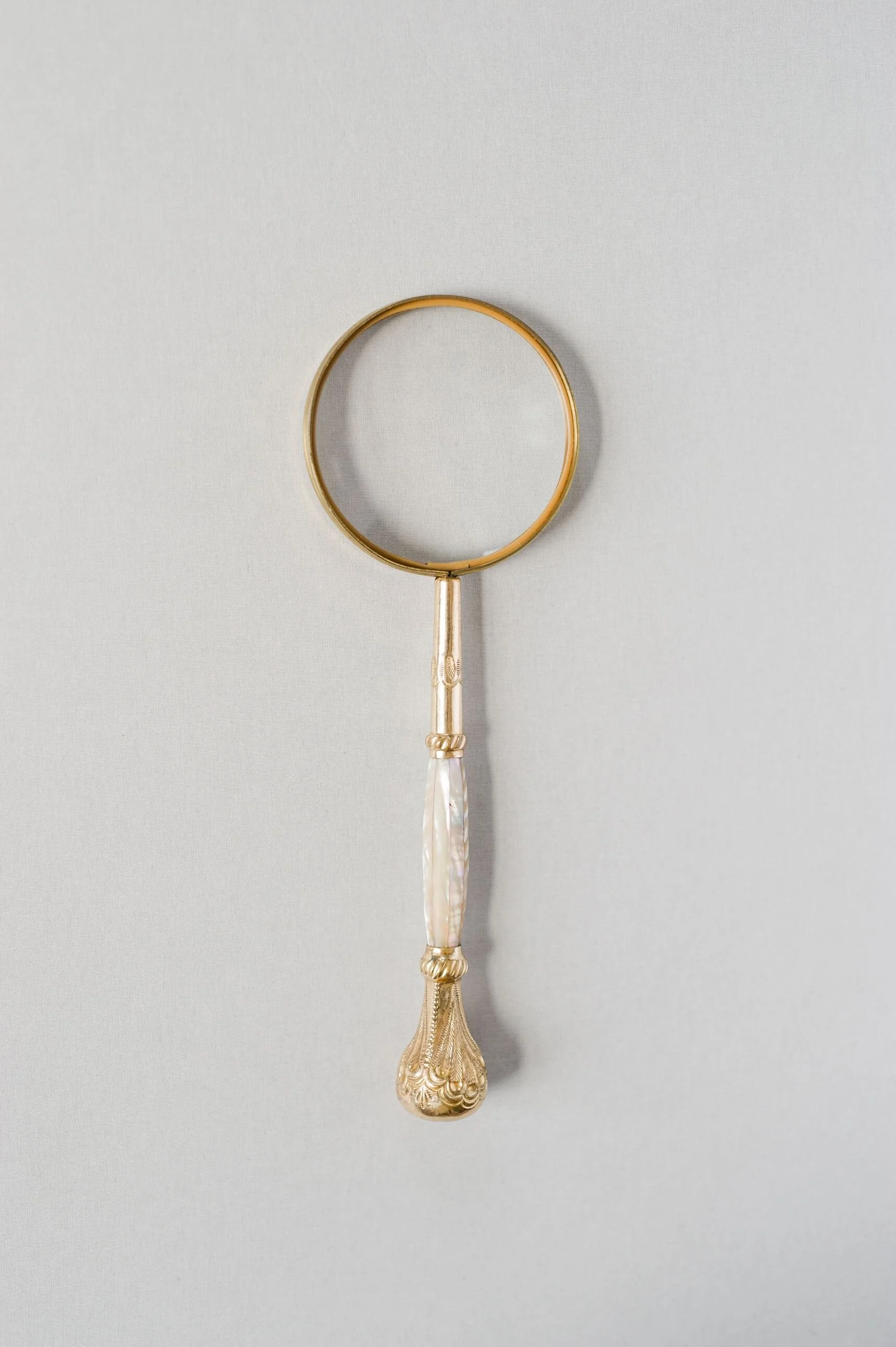 mother of pearl magnifying glass