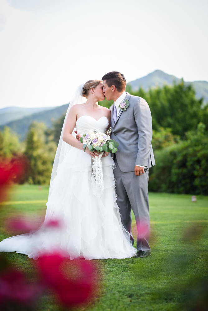 bride and groom kissing