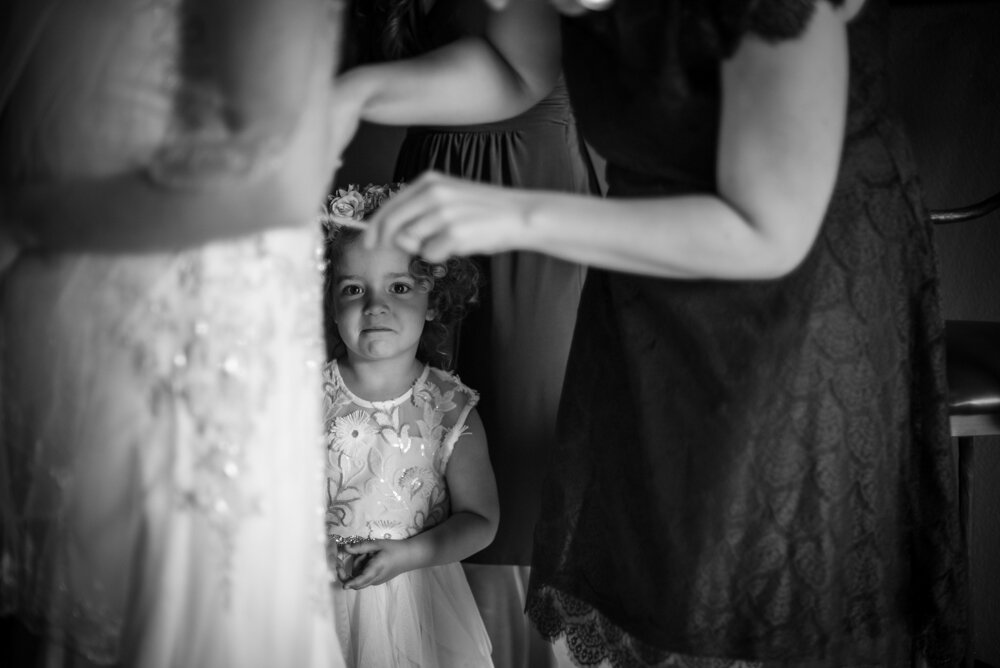 Gatlinburg mountain wedding flower girl watching bride get ready