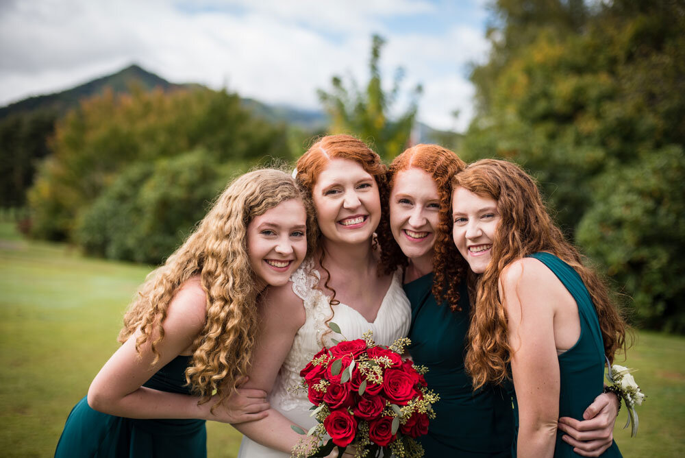 Bride and sisters family picture.