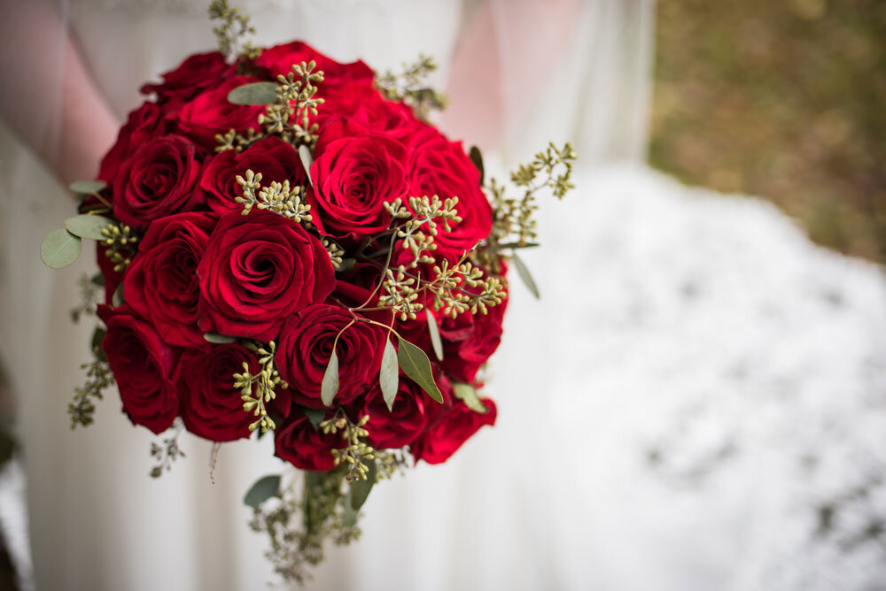 Red roses bridal bouquet.