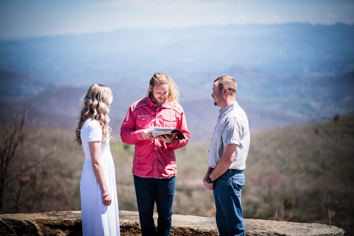 Bride and Groom getting married on mountaintop