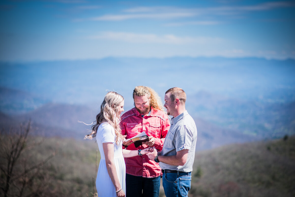 Bride and groom eloping on mountain top in NC