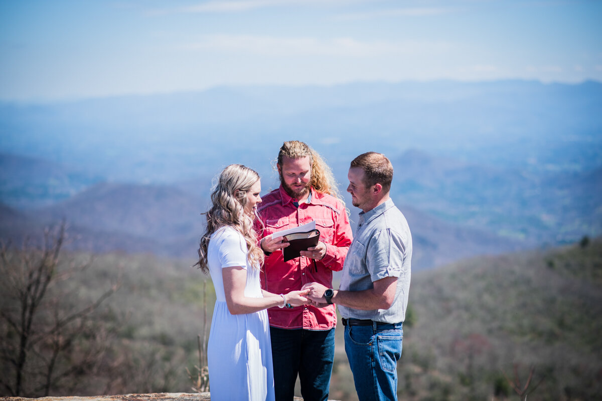 Bride and groom eloping on mountain top in NC