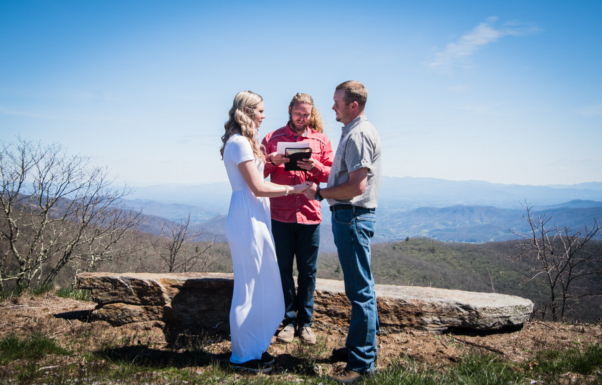 Bride and groom eloping on mountain top in NC