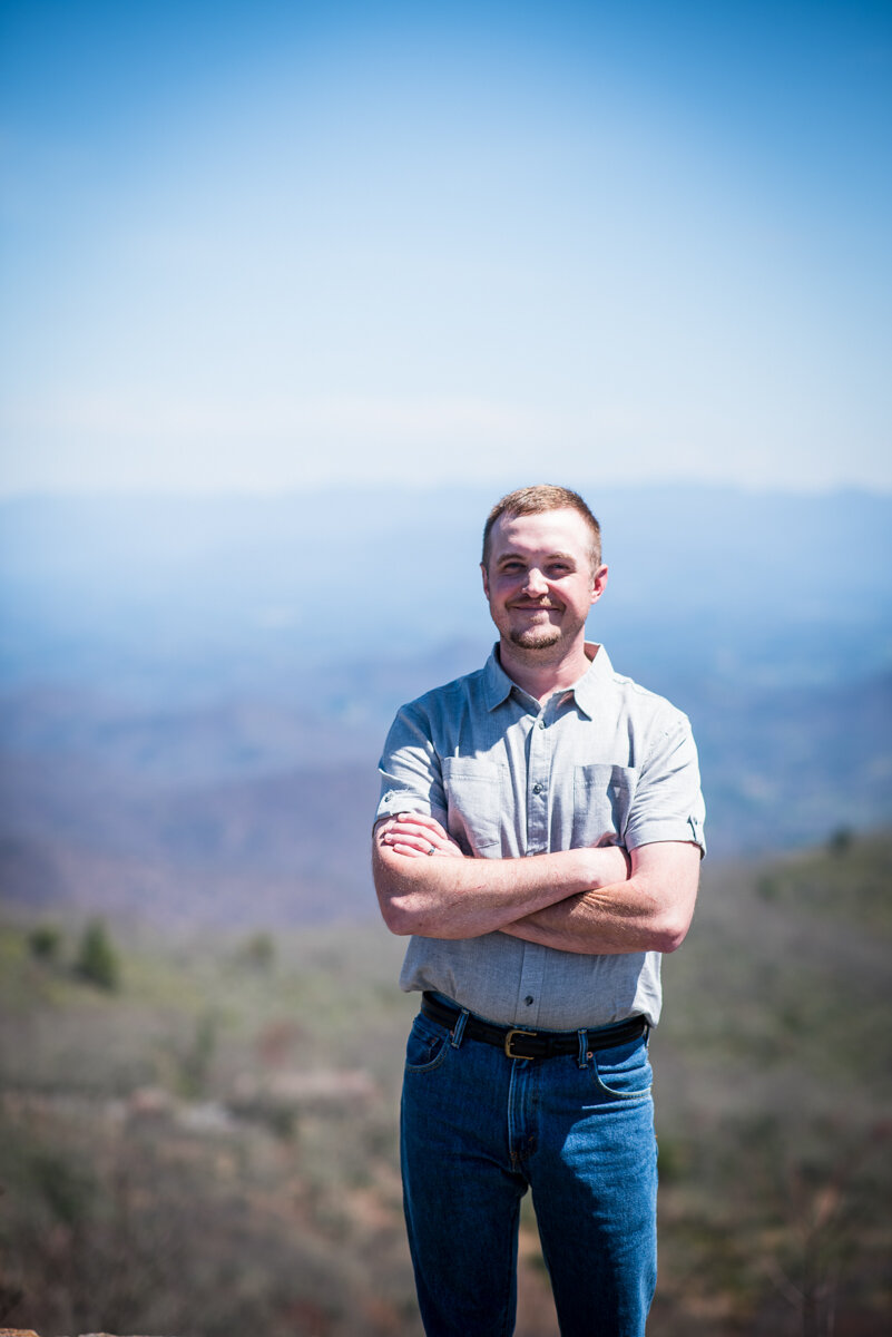 Groom's portrait at mountaintop elopement