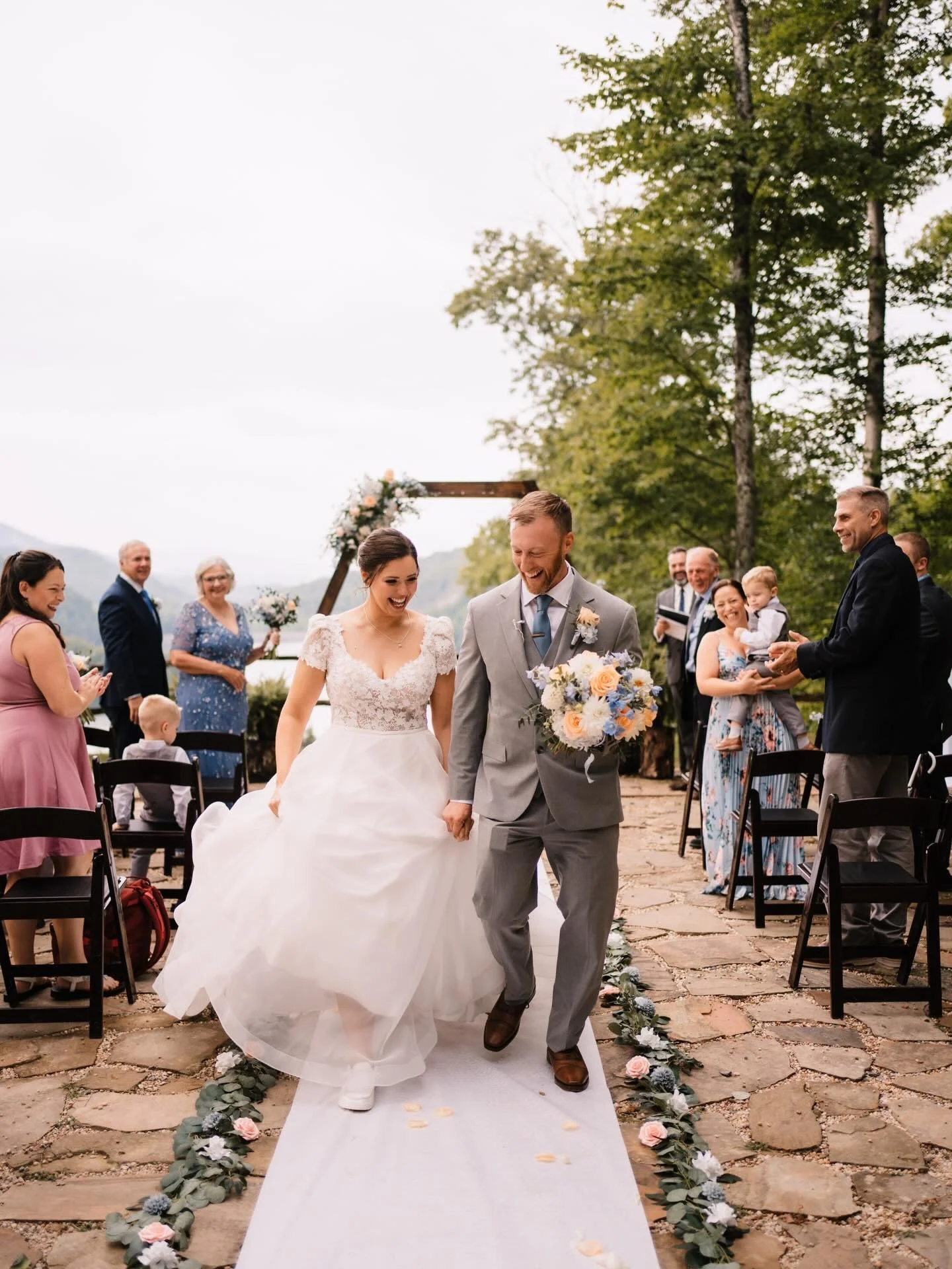 Sweet moments from a summer wedding at @nantahalaweddings 💚 @highland_gentleman @andrewsflorist #nantahalaweddings #summerwedding #waterfallphotography #mountainwedding #ido