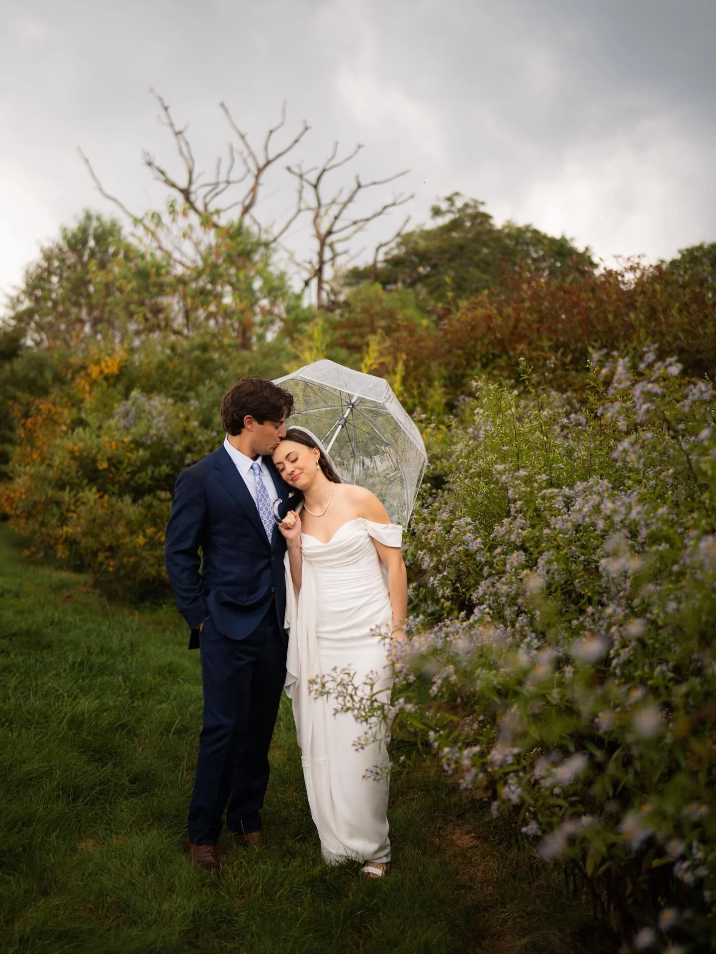 Violet + Justin started their intimate wedding at Wayah Bald for portraits and were later married at @nantahalaweddings 🩵 They finished their day off at @cherokeemountaincabins for their reception and it was a perfect day! 
.
.
.
#mountainwedding #w