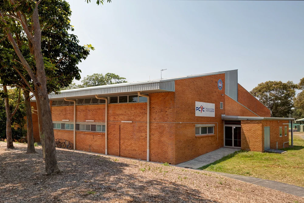 The real brick exterior and PCYC signage at PCYC Bateau Bay