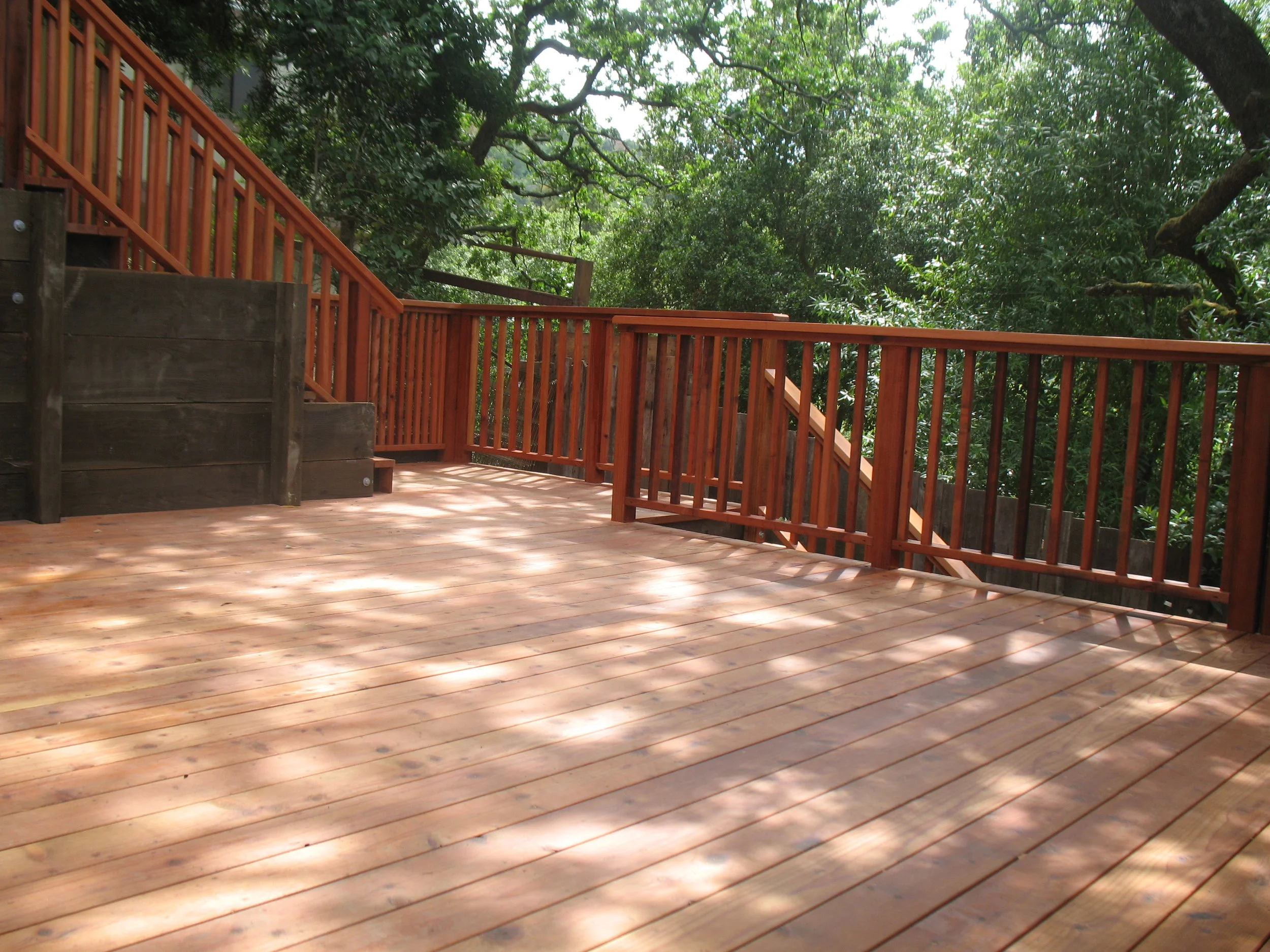 Retaining walls and redwood deck.