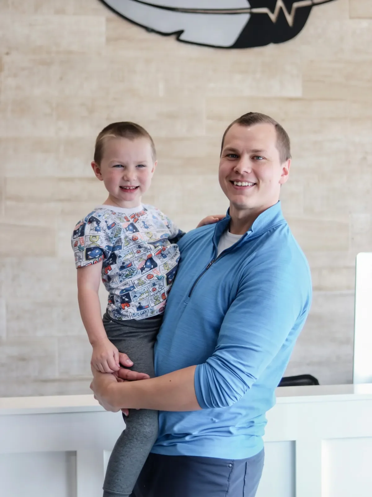 Dr. Axel Osborn from Legend Chiropractic Excelsior with his son Max Osborn