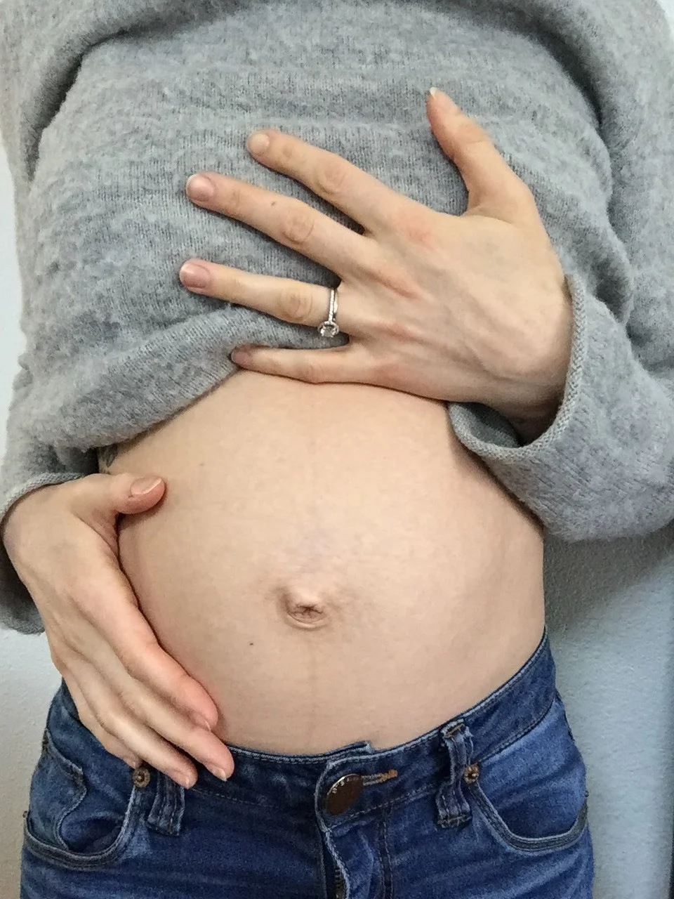 This is my belly, five months postpartum. I still have a line. I still have a stretched out belly button. I still have a little pooch. It's funny, really. Before I got pregnant, I had a six-pack, and I used to say "I work hard for my body." Well, you know what? I worked hard for this body, too. Image and words credit: Relentlesslypp
