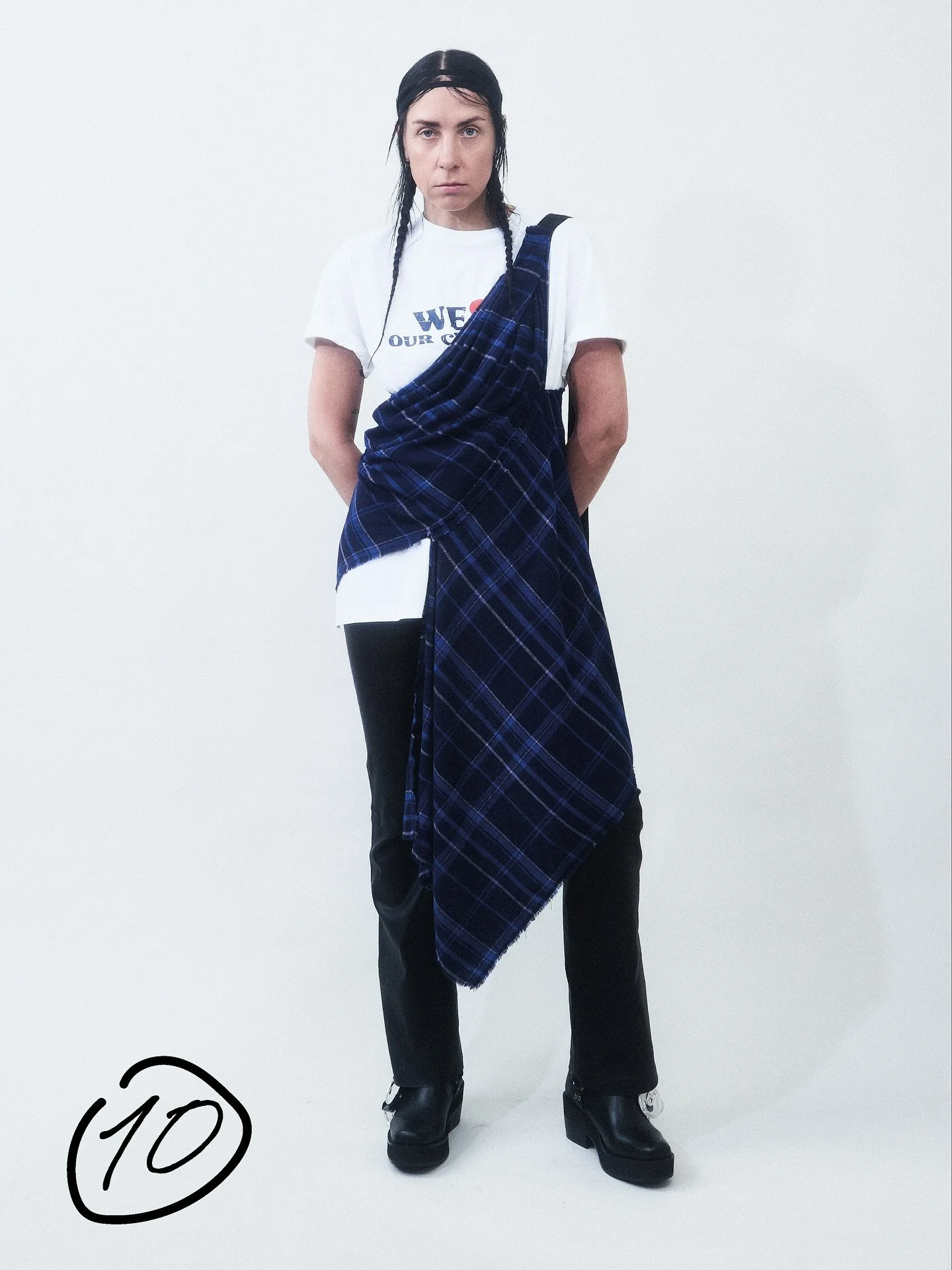 arv&reg; - ss26 - look 10

/ &ldquo;we love our customers&rdquo; t-shirt in gots certified organic cotton
/ asymmetric draped blue tartan top with elongated front panel
/ chrome free flared lamb leather trousers

photographer @claustroelsgaard 
styli