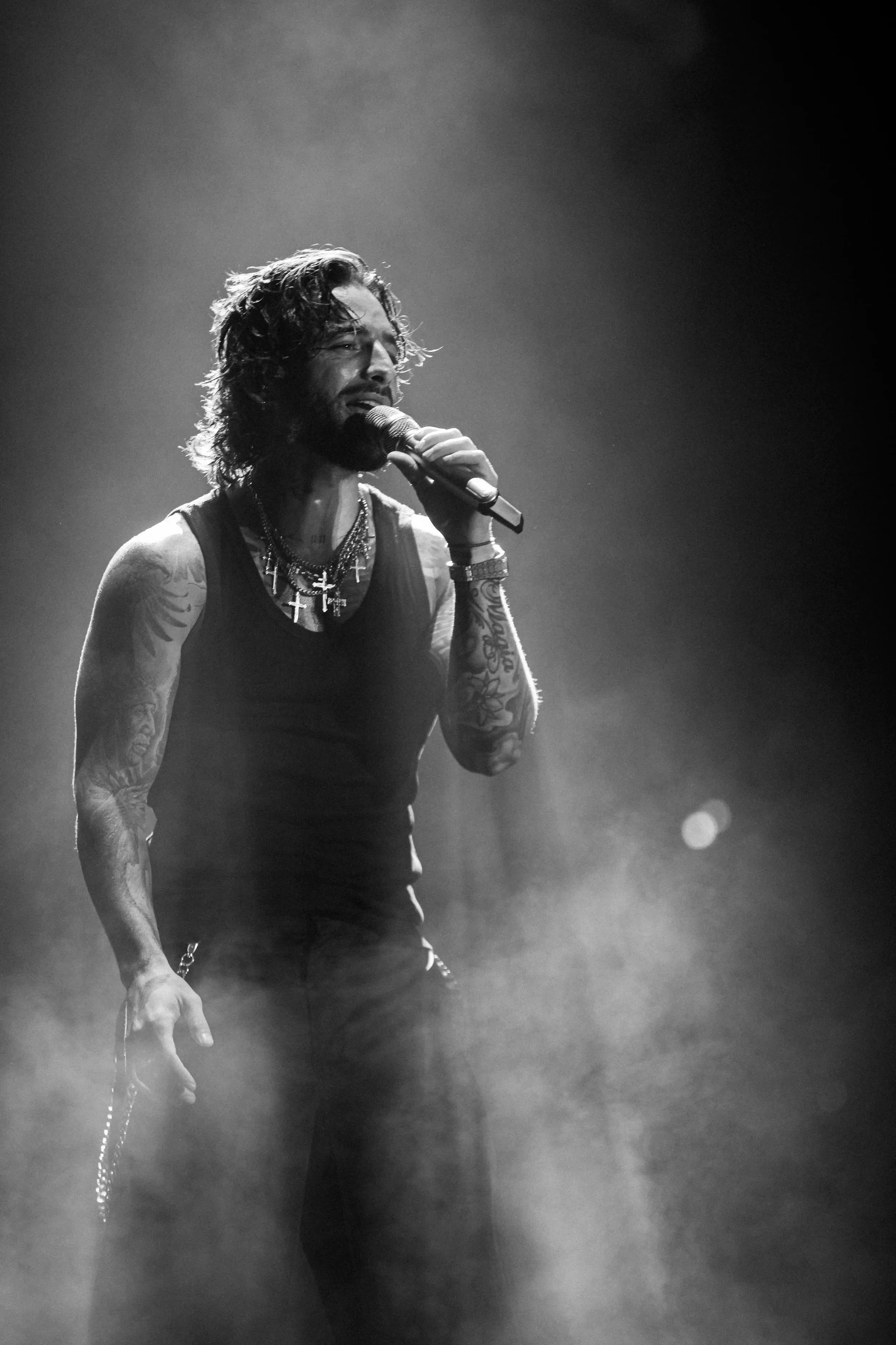 Live-Konzertfotografie eines Musikers auf der Bühne