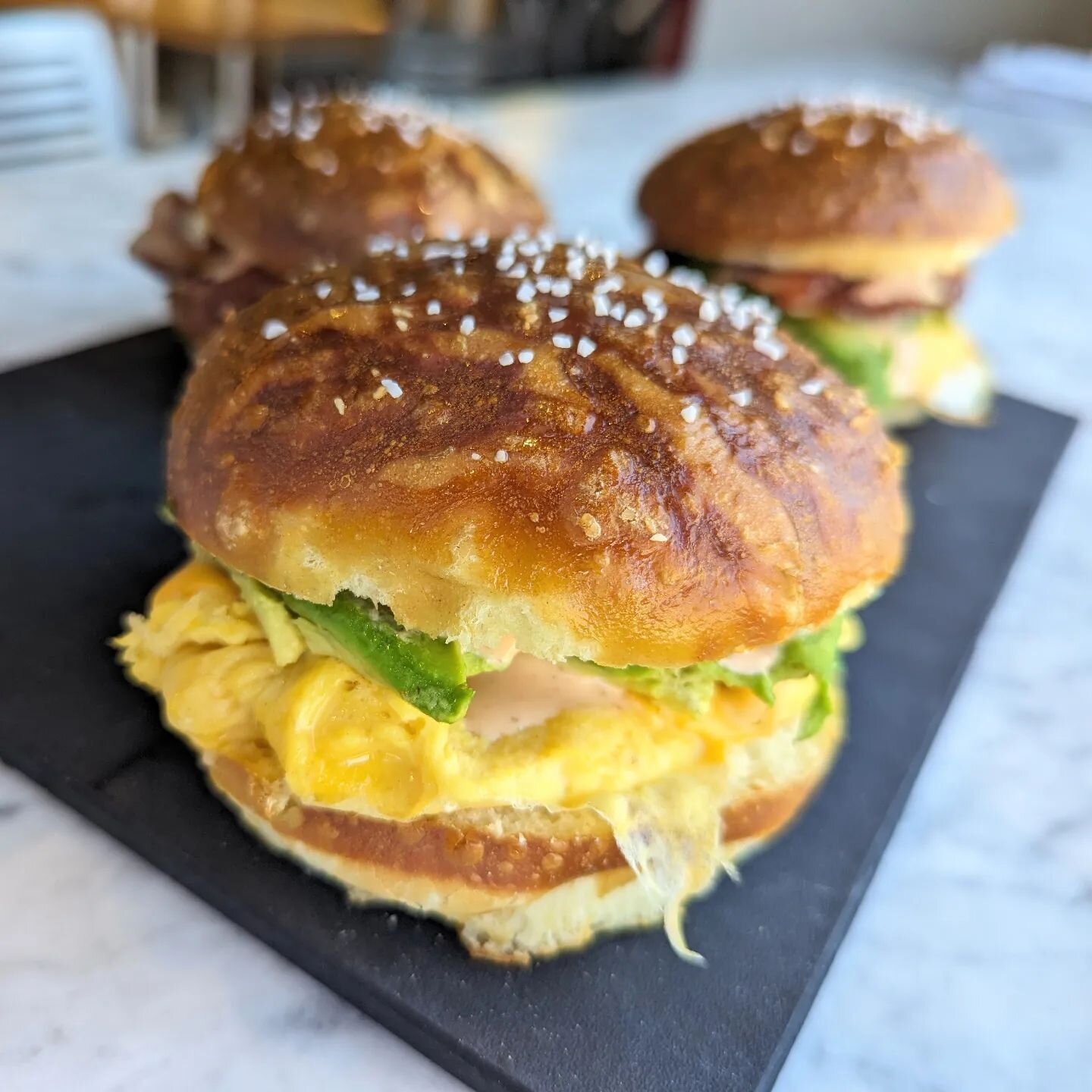Pretzel bun breakfast sandwiches and live music by Ginny Shilliday tomorrow, Sunday, 4/7!

For those of you who can't make it to @breweryoutre to grab one of our pretzels (they're available today too!), we decided to make some buns out of spare dough
