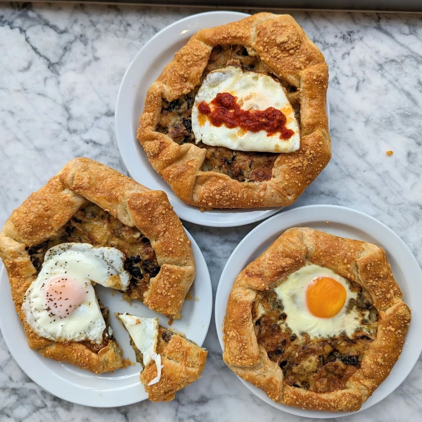 Tomorrow's Sunday brunch special is... Breakfast galette!

Wonderfully flakey pie dough filled with cheesey potatoes and ramps, topped with an egg. These are kind of large so maybe bring a friend to share it with. That way you'll have room for pastri