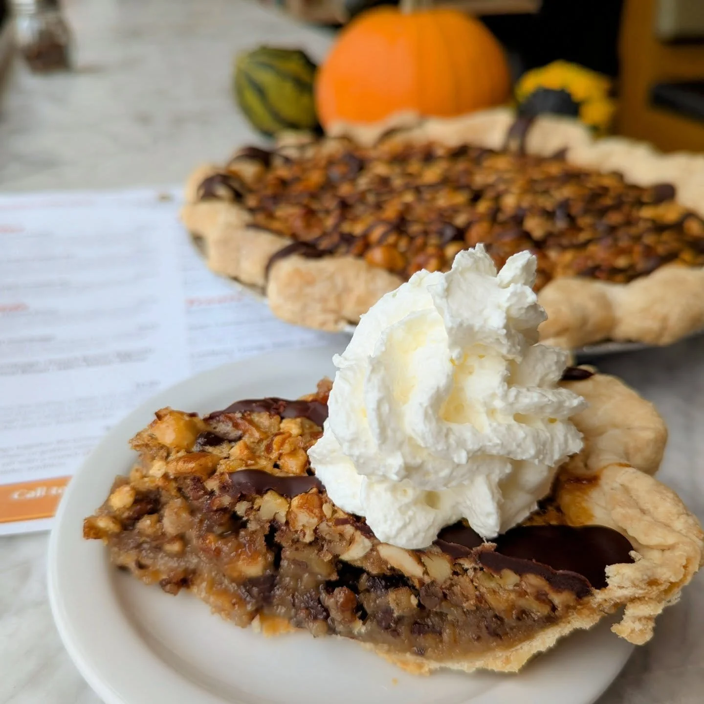 November pie of the month: Pecan, hazelnut, chocolate!

We've added some hazelnuts and chocolate to create a pecan pie with a little more depth of flavor that isn't overly sweet.  It'll be available at the bakery all month AND will also be available 