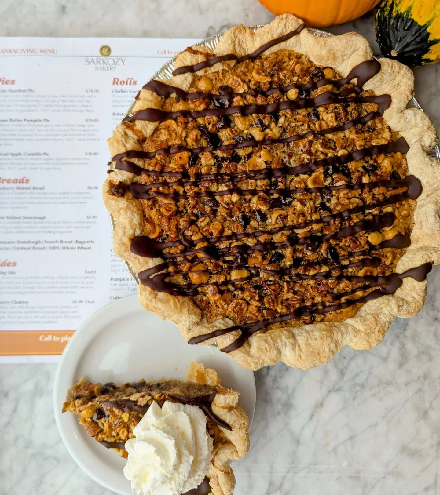 We've got a fresh batch of pecan pie this Friday morning.

With added chocolate and hazelnuts you get a flavor that isn't as one note as a traditional pecan pie. Deeper, richer, and nuttier, instead of the saccharine overload that can sometimes come 