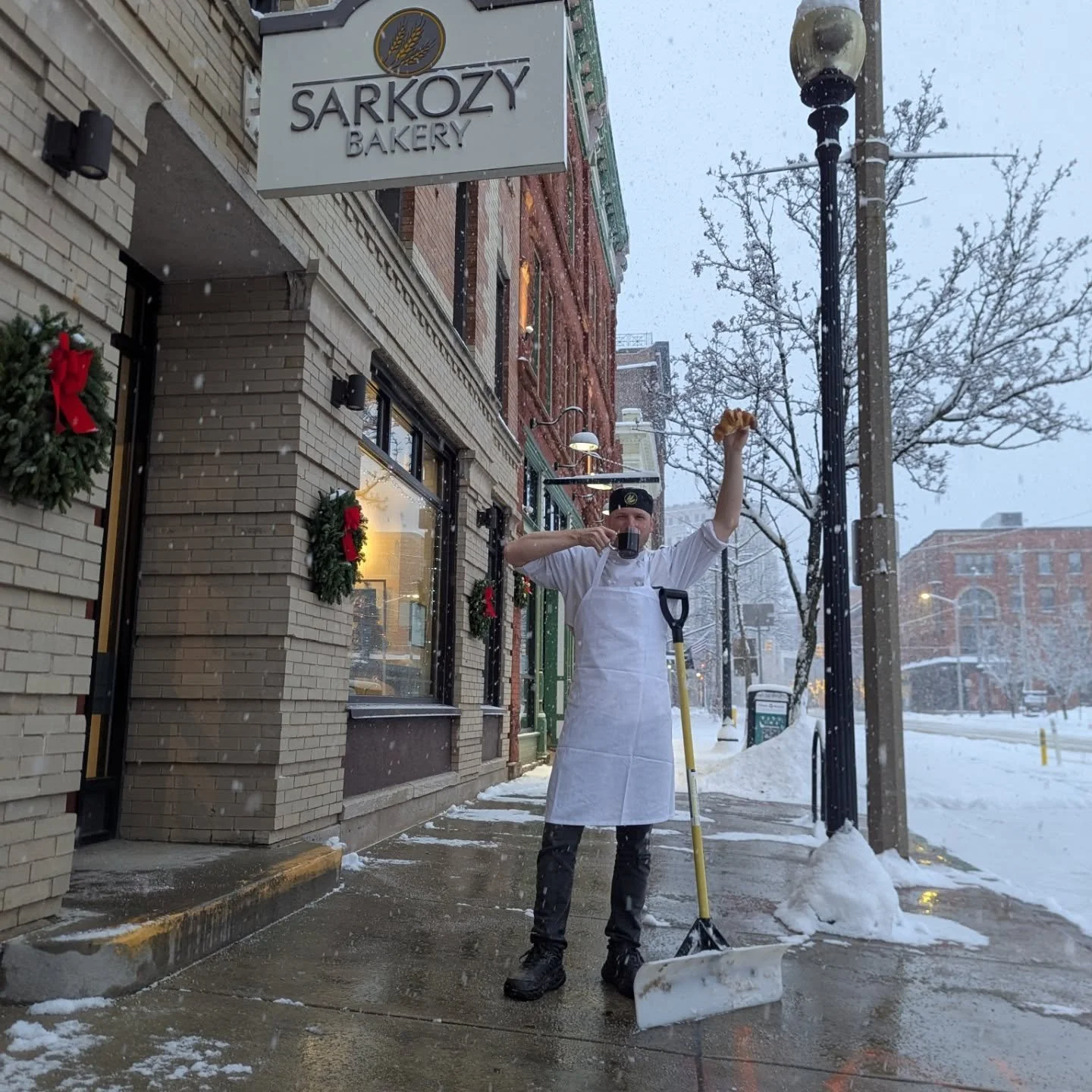Hot coffee and a croissant right out of the oven is all you need to get this snow shoveled early!

We've got our front nicely cleaned off for anyone Michigan enough to come in today! Bread, pastries, and holiday treats are coming out of the oven as w