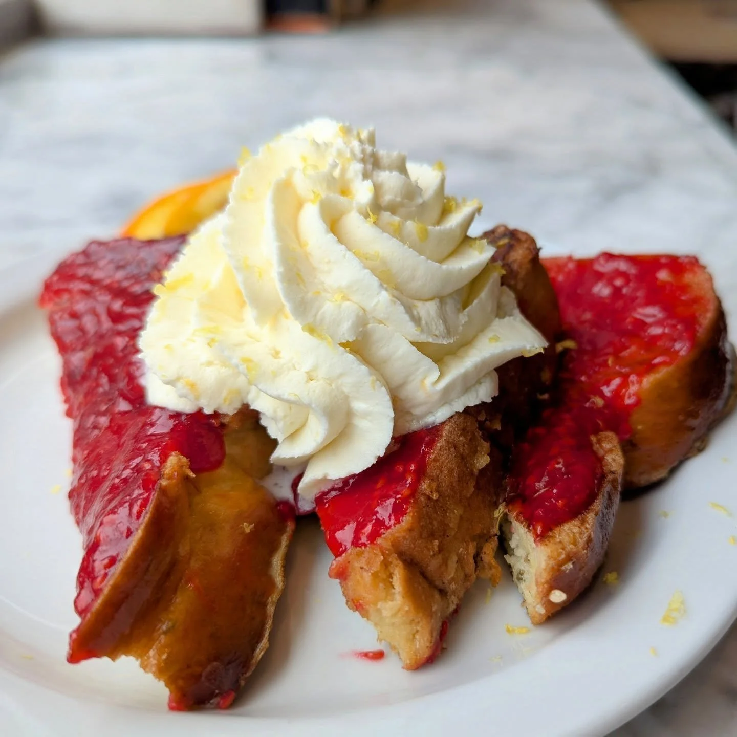 Special announcement: we will be closing at 2pm today, Sunday, 2/22. Read till the end to find out why.

The stars have aligned! Josephine's french toast with a raspberry compote and lemon diplomat cream is today's brunch.

Is this all an excuse to u