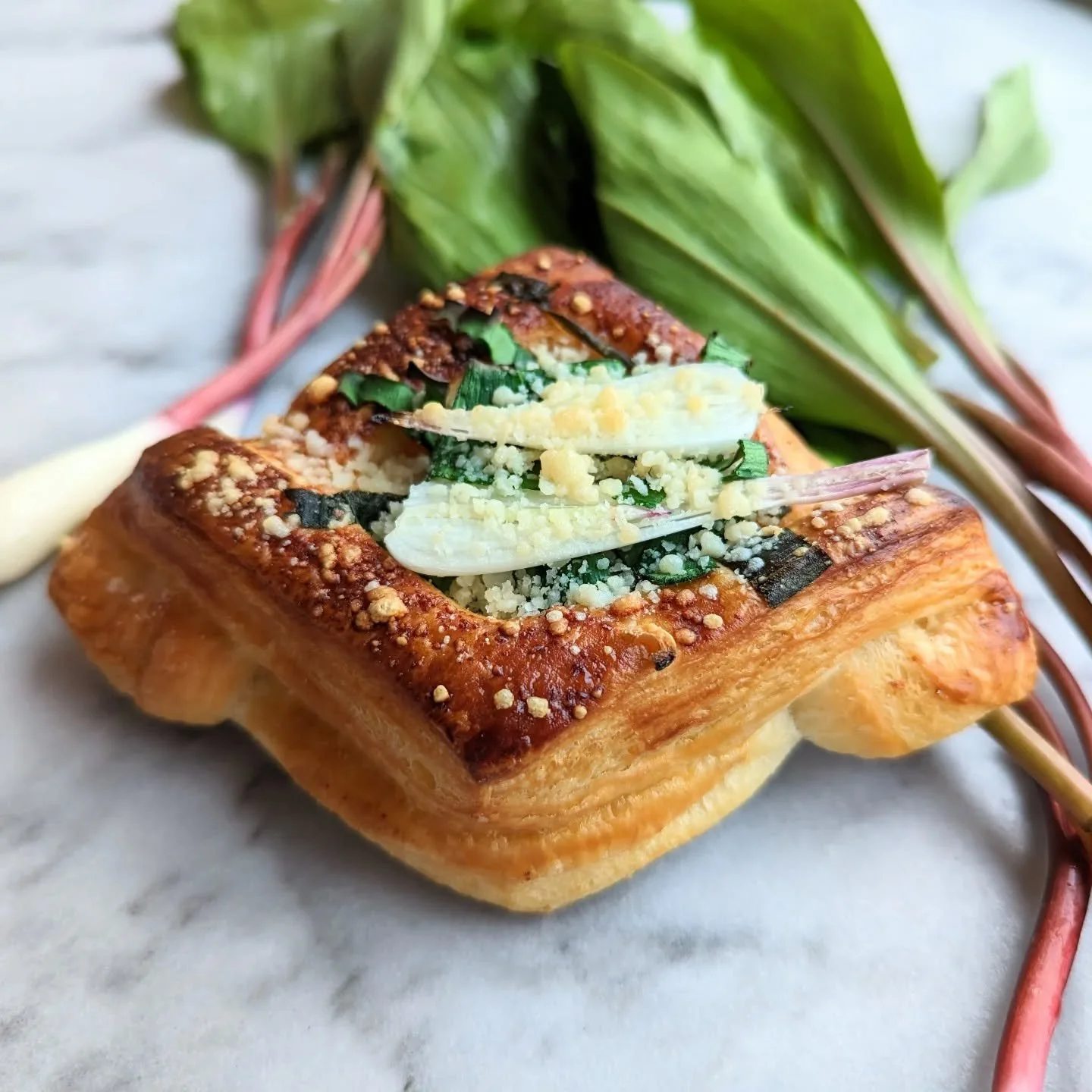 The ramp harvest was incredible this year so we've got plenty to use for ramp croissants!

Topped with a hearty amount of fresh parmesan that pairs excellently with he garlicky-oniony ramp flavor, these are a fantastic savory pastry for anyone lookin
