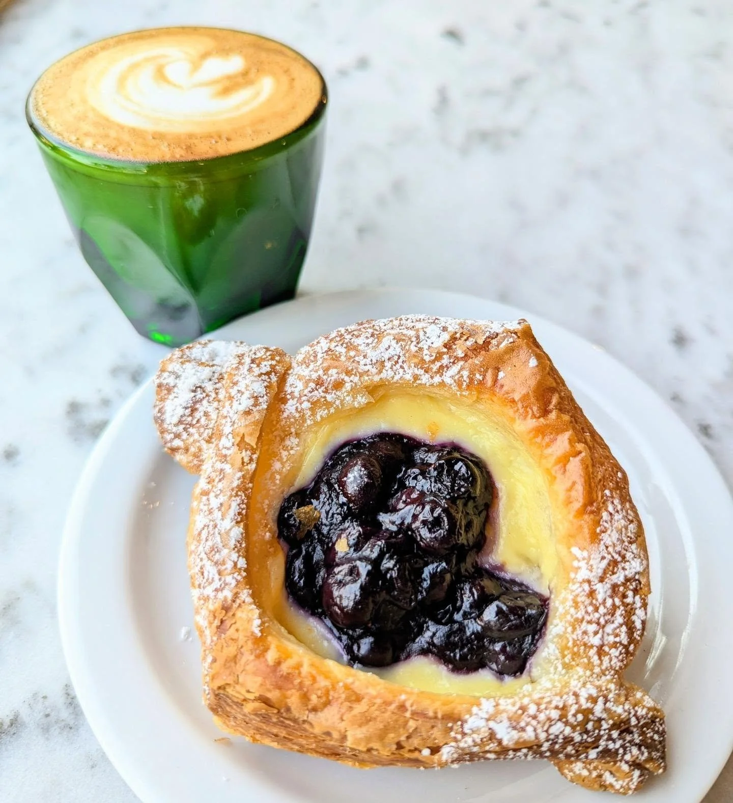 The bakery is back open after way too quick of a Labor Day.

The bakers got to work early to bring us this delicious blueberry and lemon pastry cream croissant. As well as dozens of other breads, pastries, and cookies!

Swing by for a pick me up, may