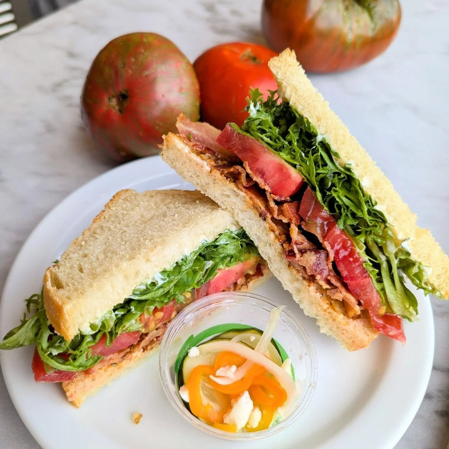 BLTeason is officially upon us!

You all have been wonderfully patient with us and yes it feels late in the year, but a truly delicious tomato takes time. They are paradoxically ephemeral. And they are perfectly imperfect.

But the wait is rewarded w