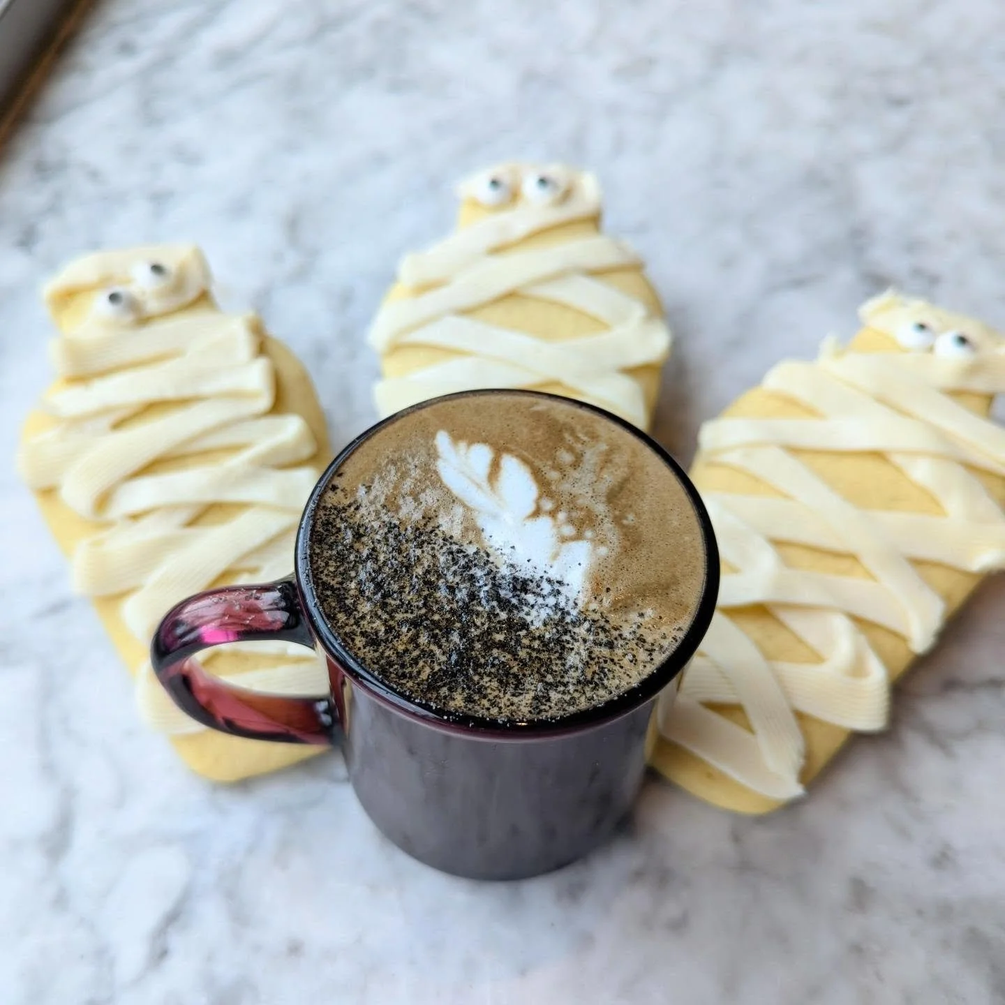 Mummy cookies here just in time for October!

And if that's not spooky season enough for you, we're still serving up black sesame flat whites this week! More autumnal delights to come.

#mummycookies #cookies #mummies #bakery #kalamazoo
