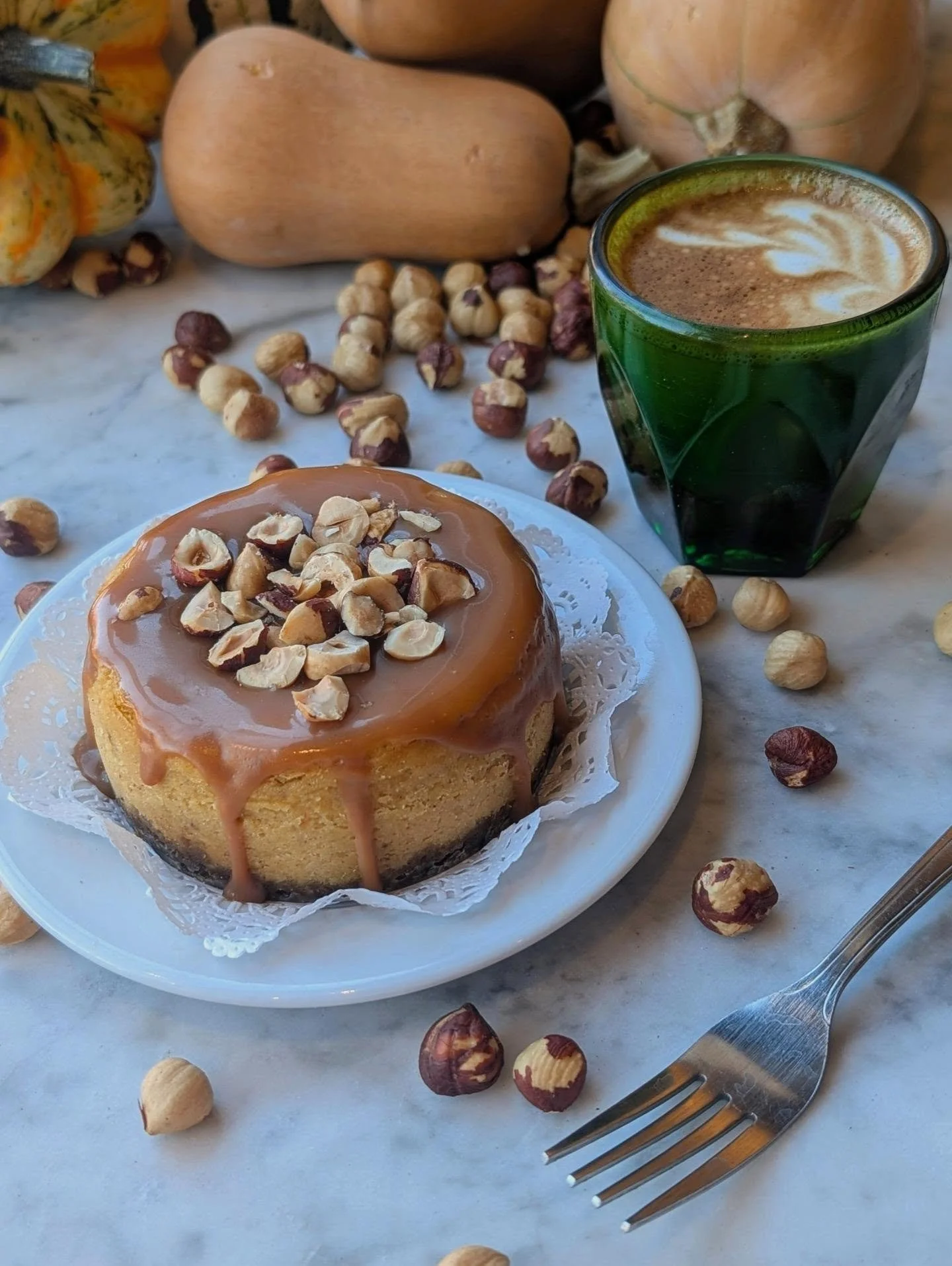 Autumn means falling leaves, apple cider, and SQUASH! Introducing our new Butternut Chai Cheesecake. Roasted butternut squash from @crispcountryacres, chai spices and our ginger cookie crust bring this cozy cheesecake to life! We top it with our bour