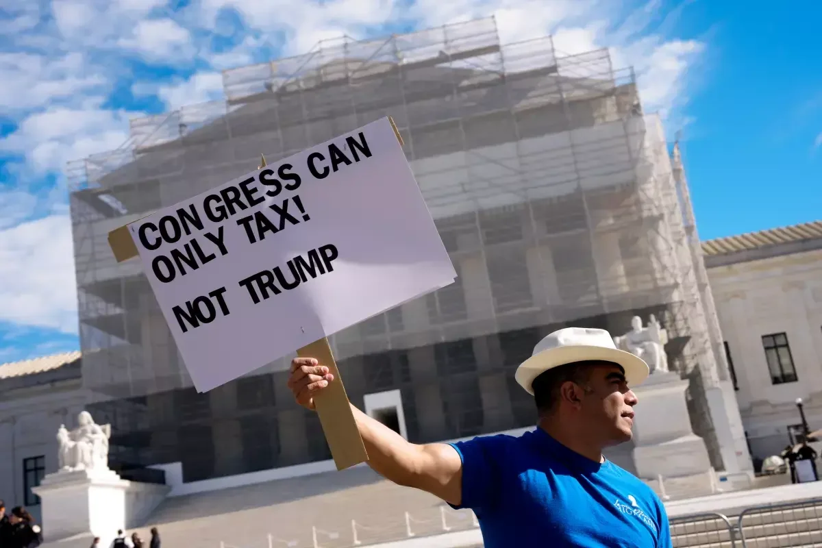A demonstrator outside the Supreme Court in November 2025. (Andrew Harnik /Getty Images)