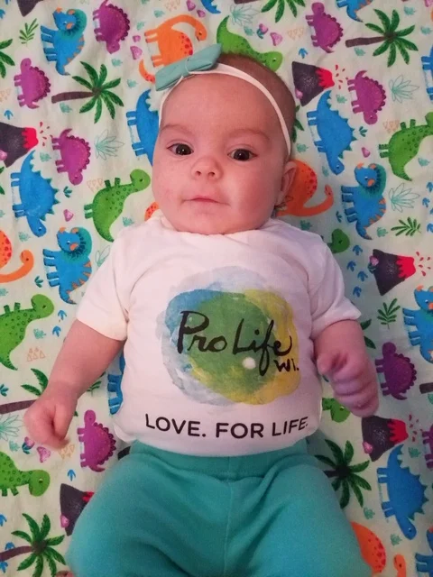 Baby Hannah in PLW onesie.jpeg