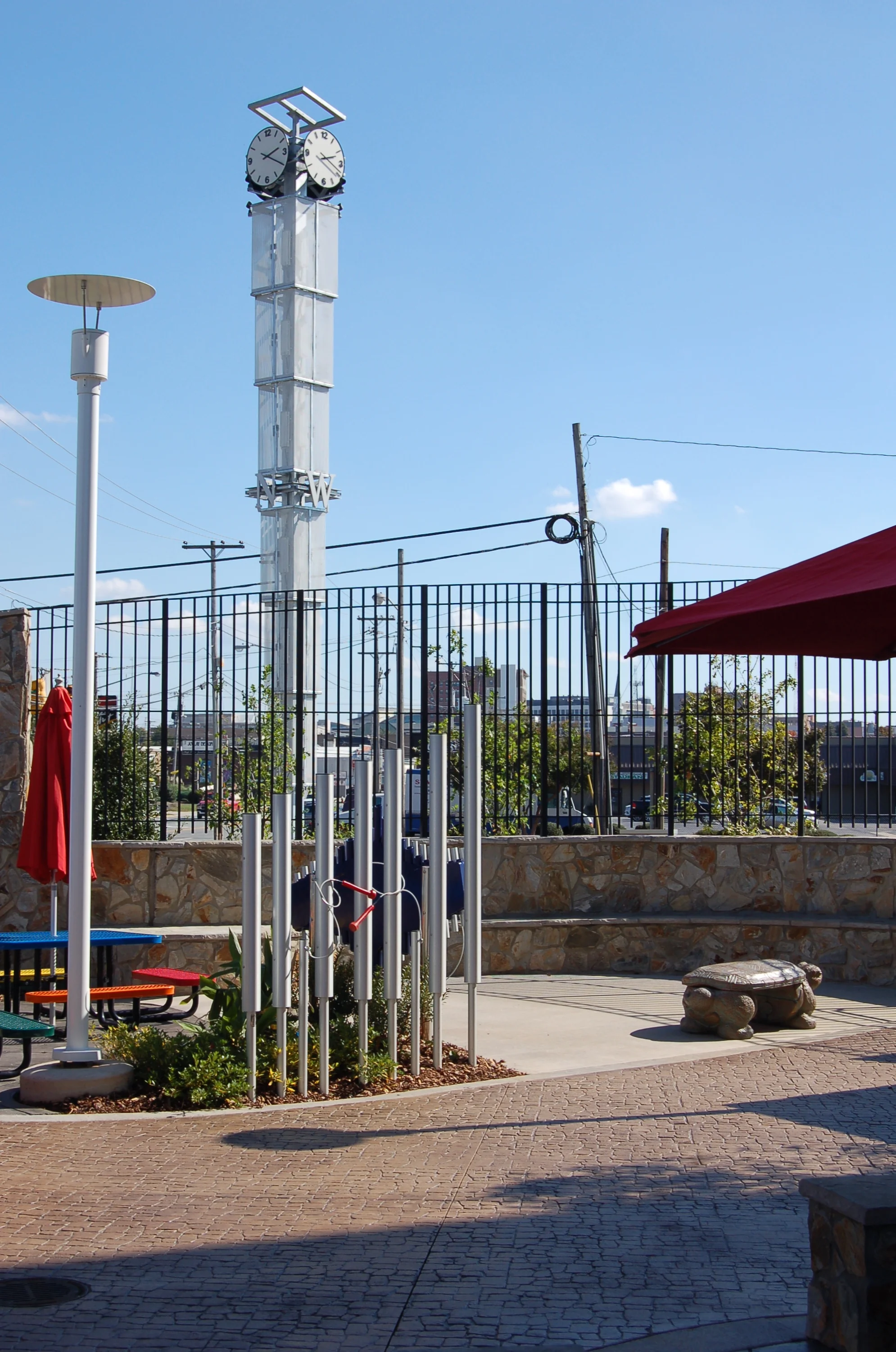 08 - chimes with clock tower in the background.JPG