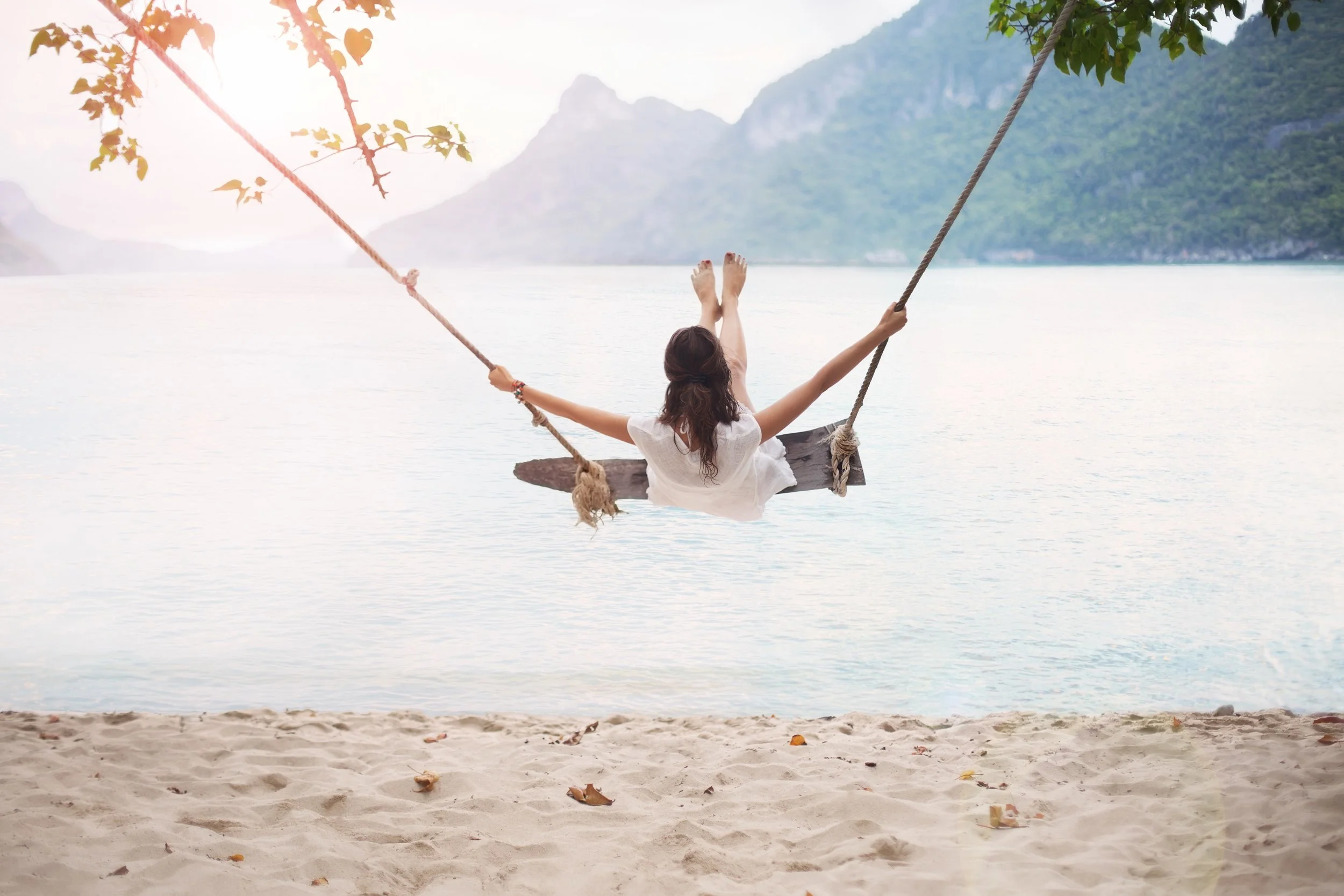 woman-on-swing-beach.jpg