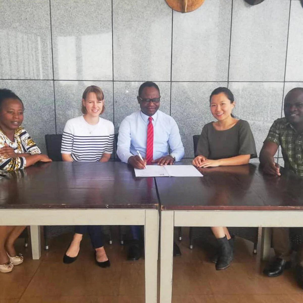 Liberty Shared sign an MOU with Malawi Network Against Trafficking