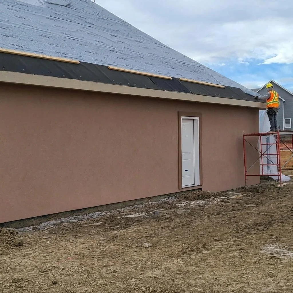 stucco install in winter tenting for heat Precision Plastering Berthoud CO