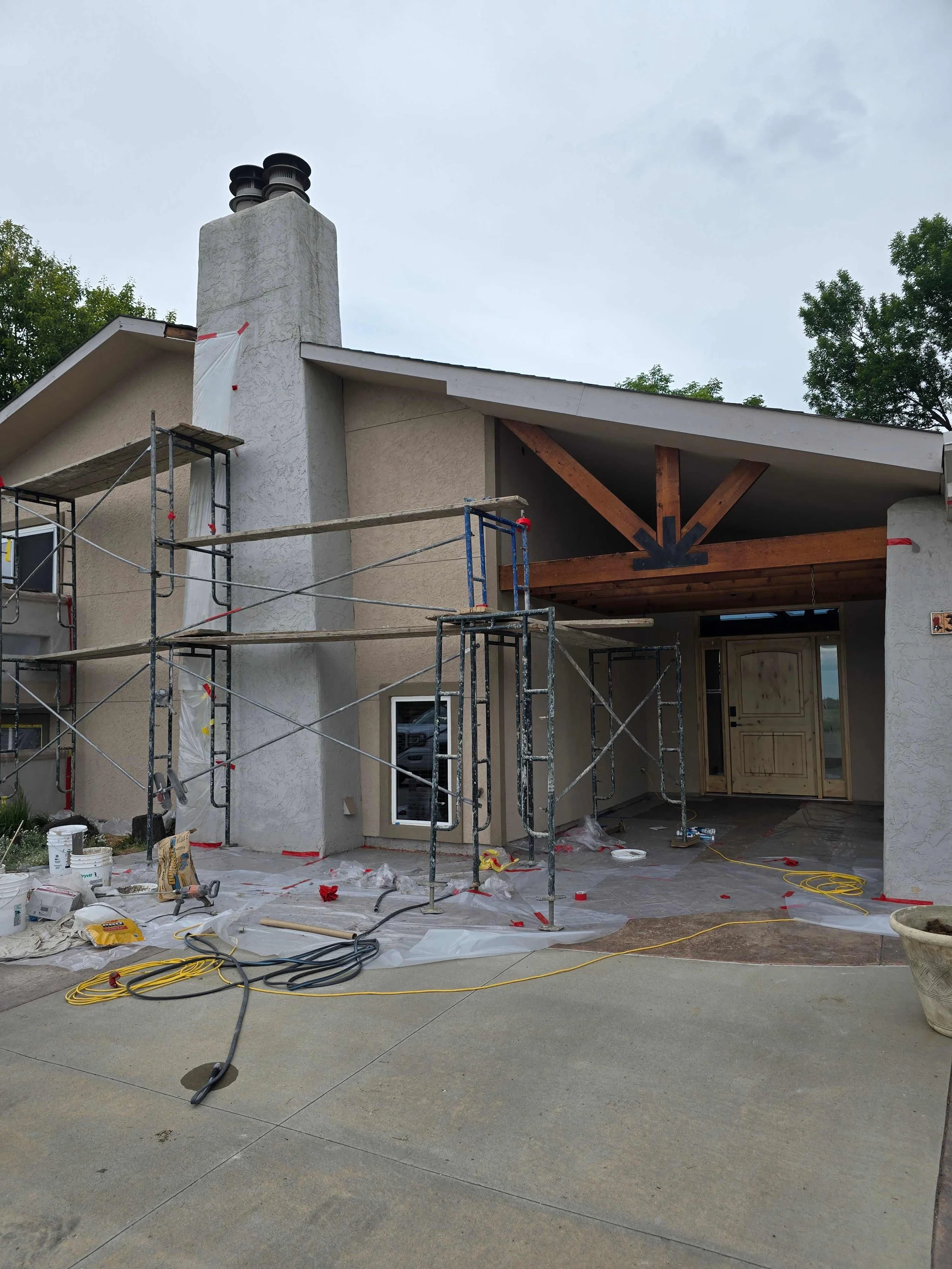 Loveland Stucco on siding lath and modern finish