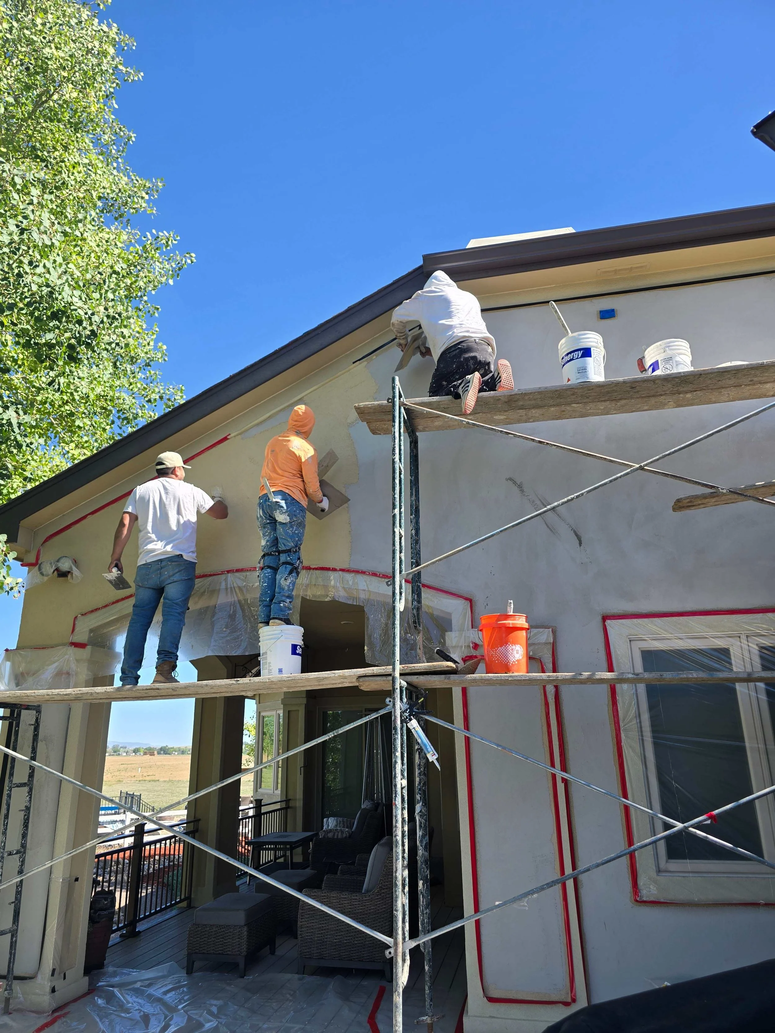 Stucco redash hail damage repairs Precision Plastering Lovelanf CO