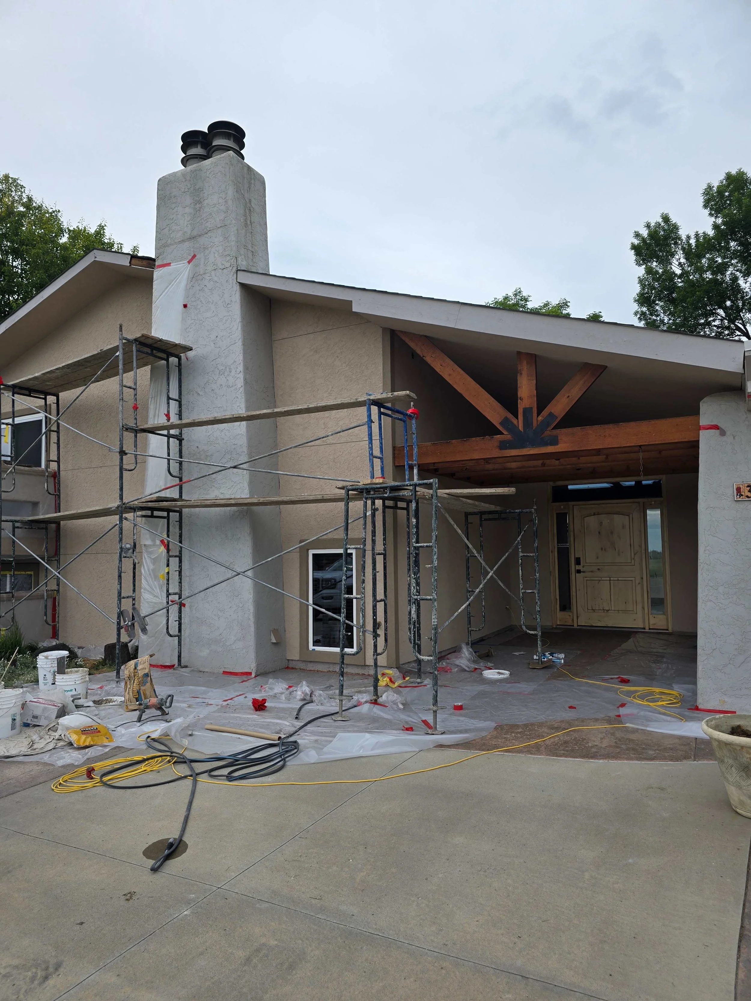stucco installation replacing wood siding Precision Plastering