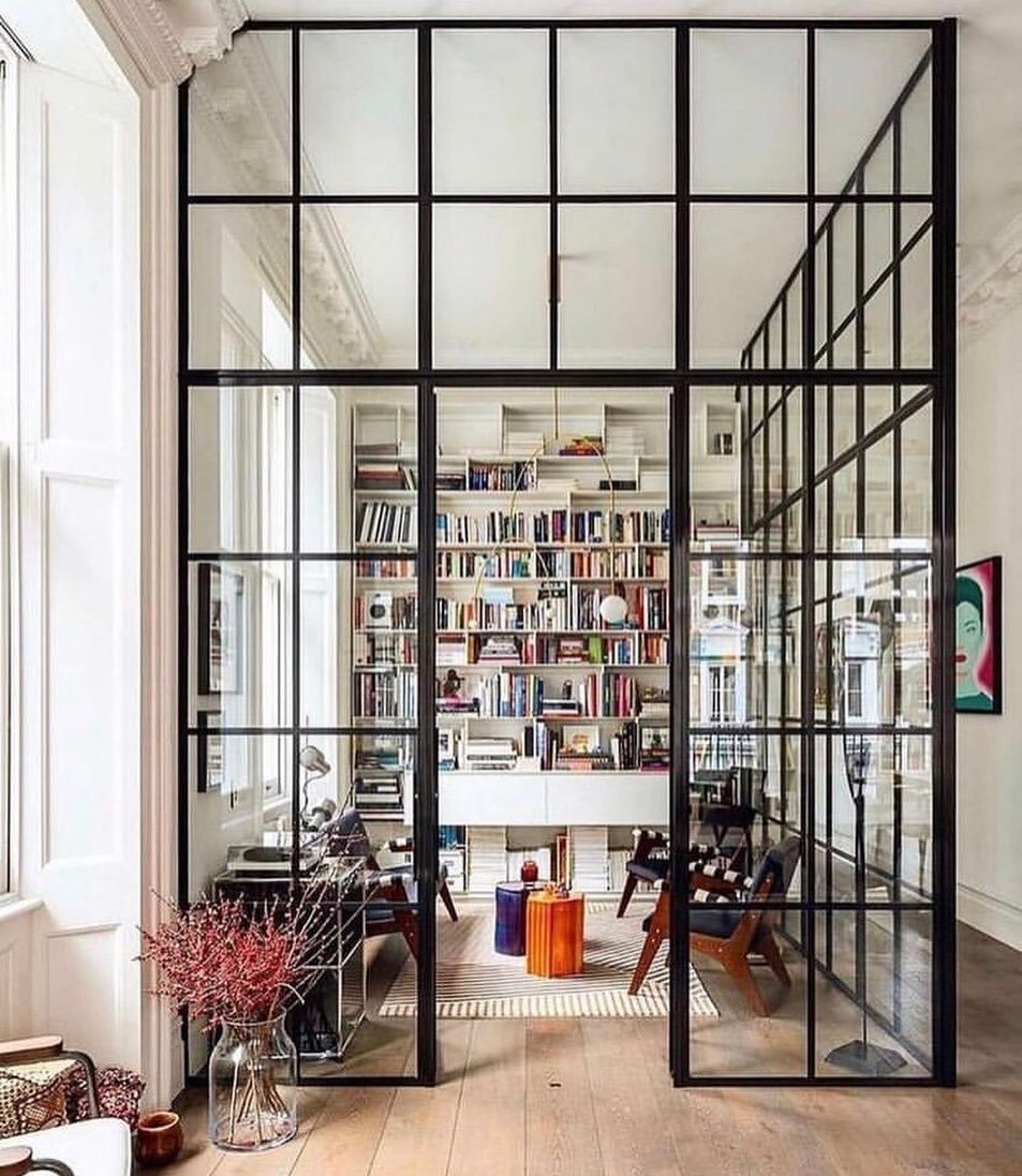 In love with these floor to ceiling glass walls

@michaelisboyd 

#glassroom #glasswall #blacksteeldoors #glasslibrary #dreamofficespace