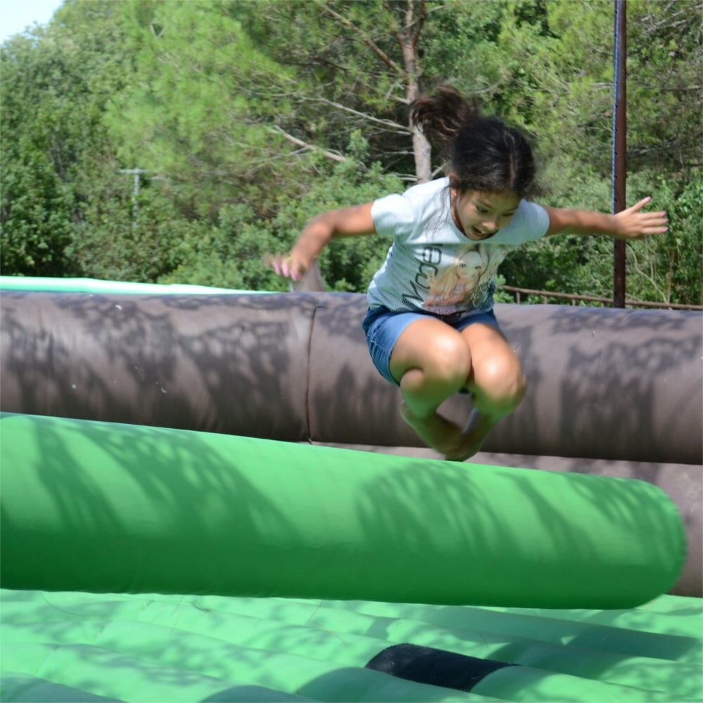 girl jumping spain games barcelona-min.JPG