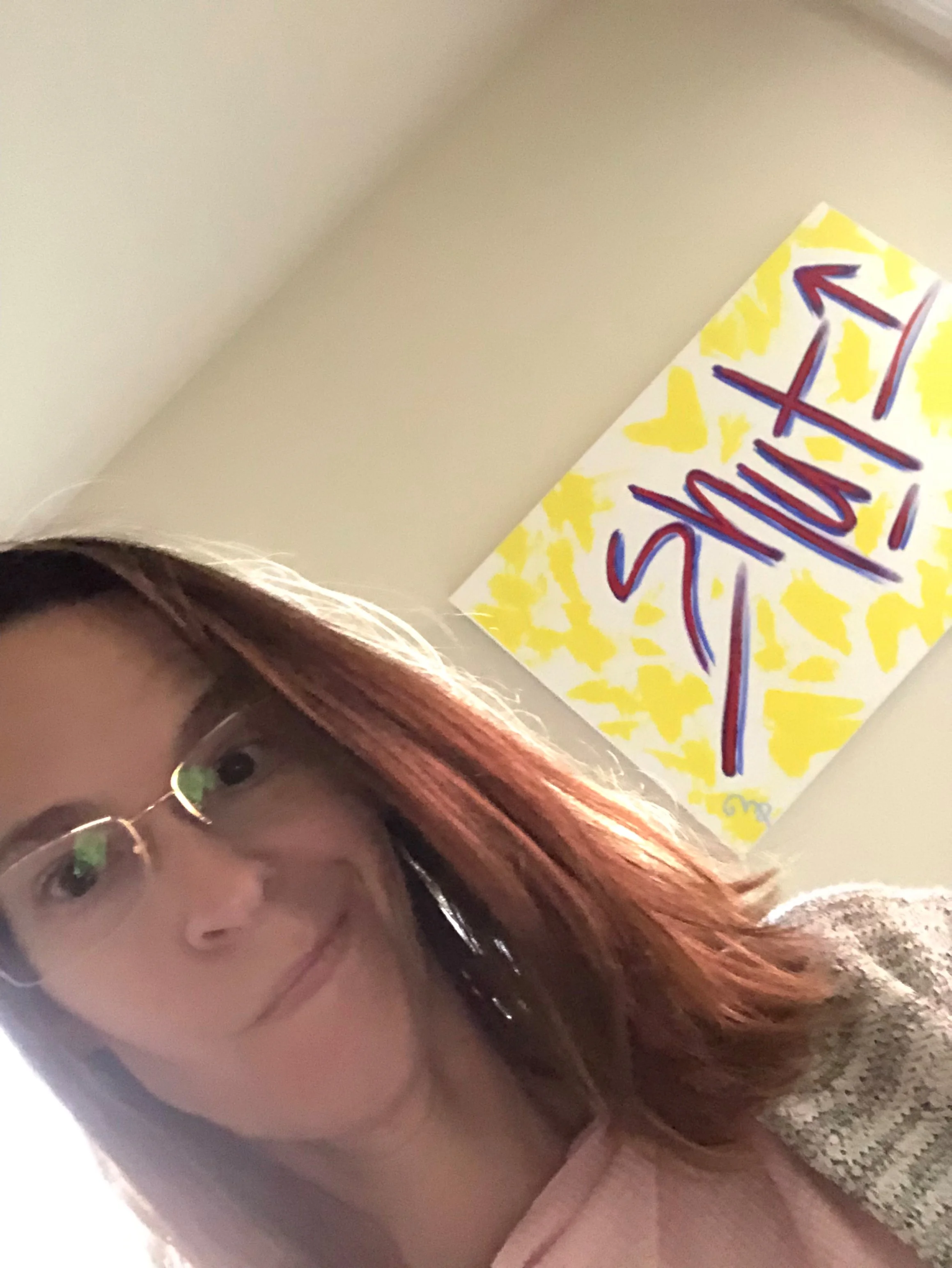As you can see, I’m not quite a selfie expert. But, I wanted to show you what one of the paintings looks like.