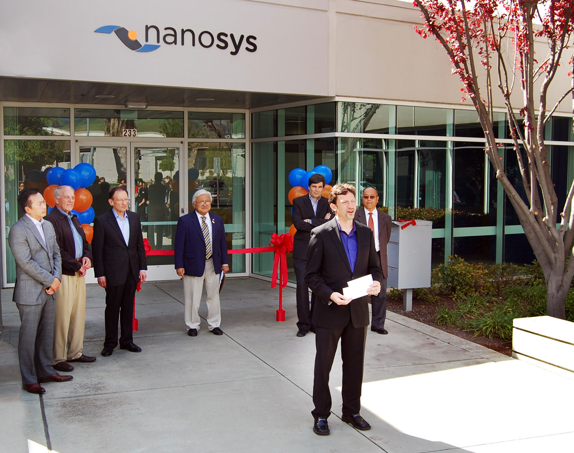 Nanosys Milpitas Ribbon Cutting Ceremony; pictured from left to right are Nanosys Board Members Nelson Chan, John Young and Steve Goldby; Representative Mike Honda, Erik Jostes, Nanosys CEO Jason Hartlove and Milpitas Mayor Jose Esteves
