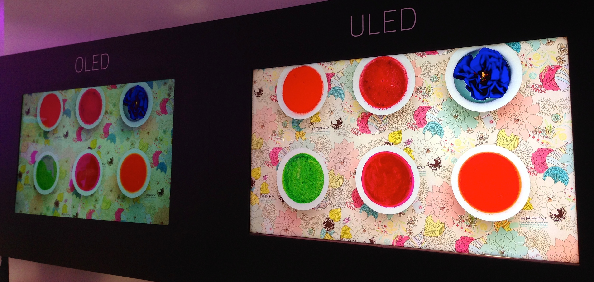 Hisense dynamic backlit, Quantum Dot "ULED" LCDs (right) take the Pepsi challenge with OLED at IFA 2014 in Berlin.