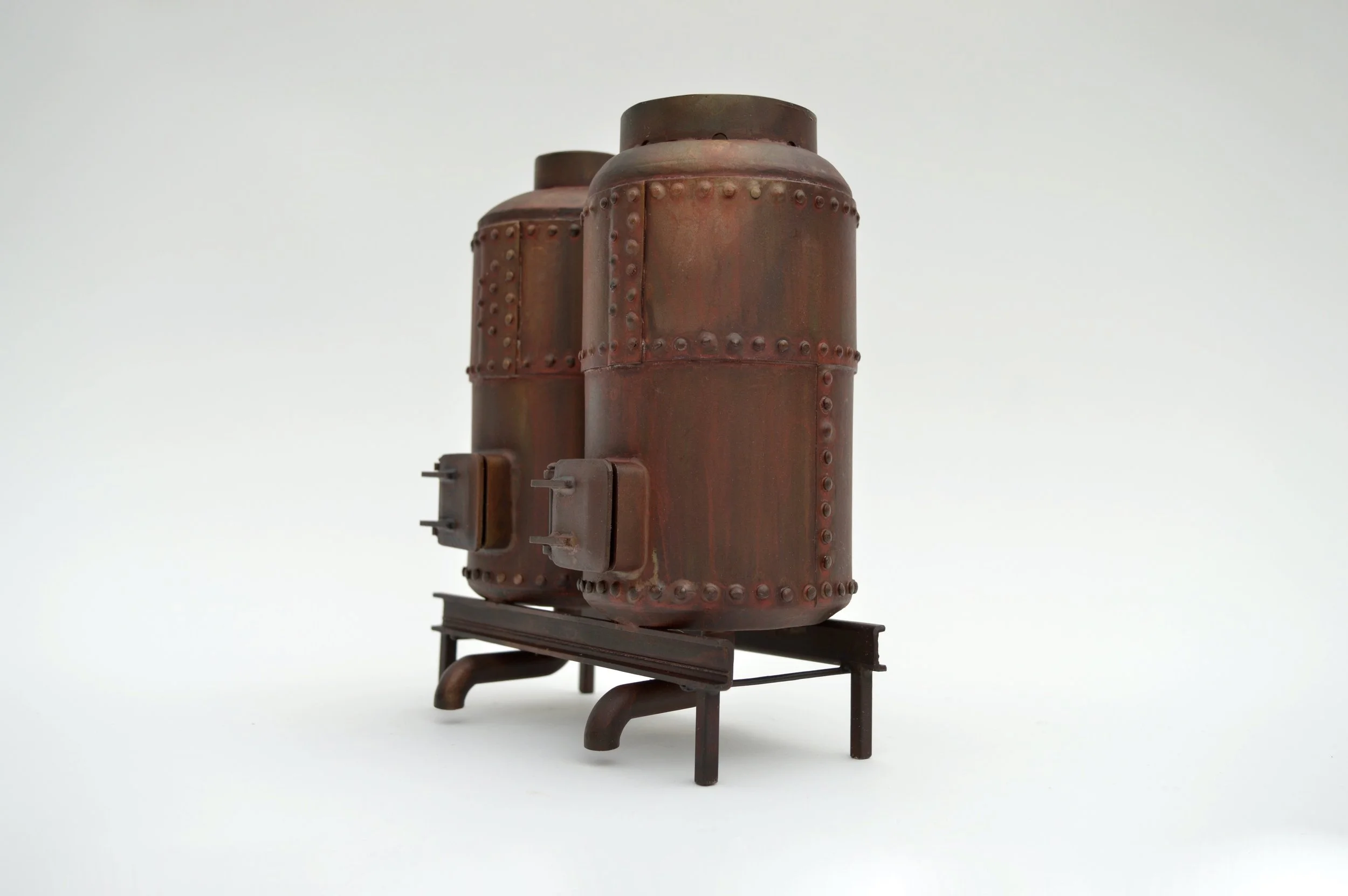 Frans Lotz, “Fatbacks”, nickel plated steel with patina, 2023, 6 x 4 x 7.5 inches.