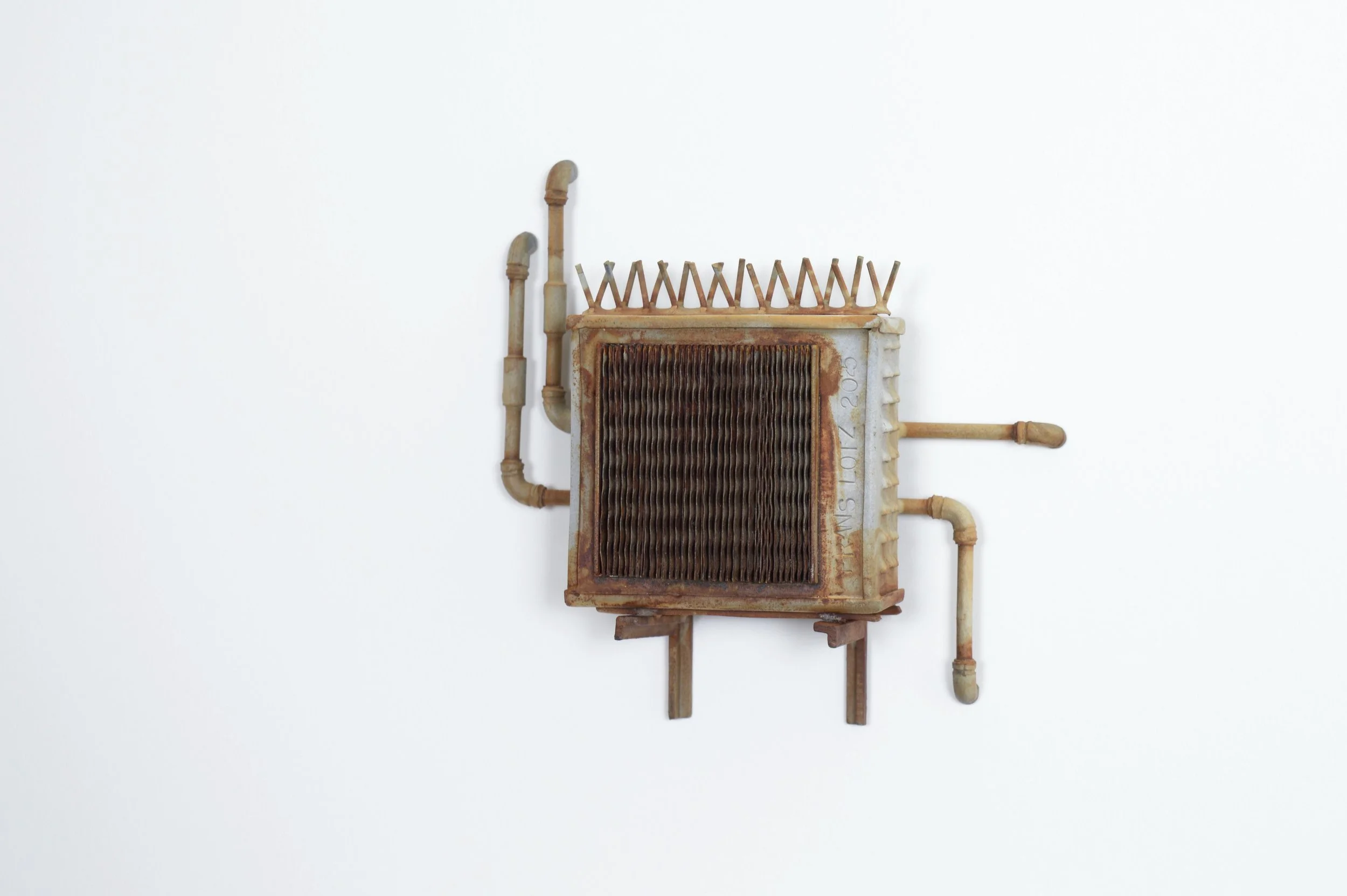 Fraans Lotz, “Secret Handshake”, nickel plated steel with patina, 2025, 4.5 × 4.5 × 1.5 inches.